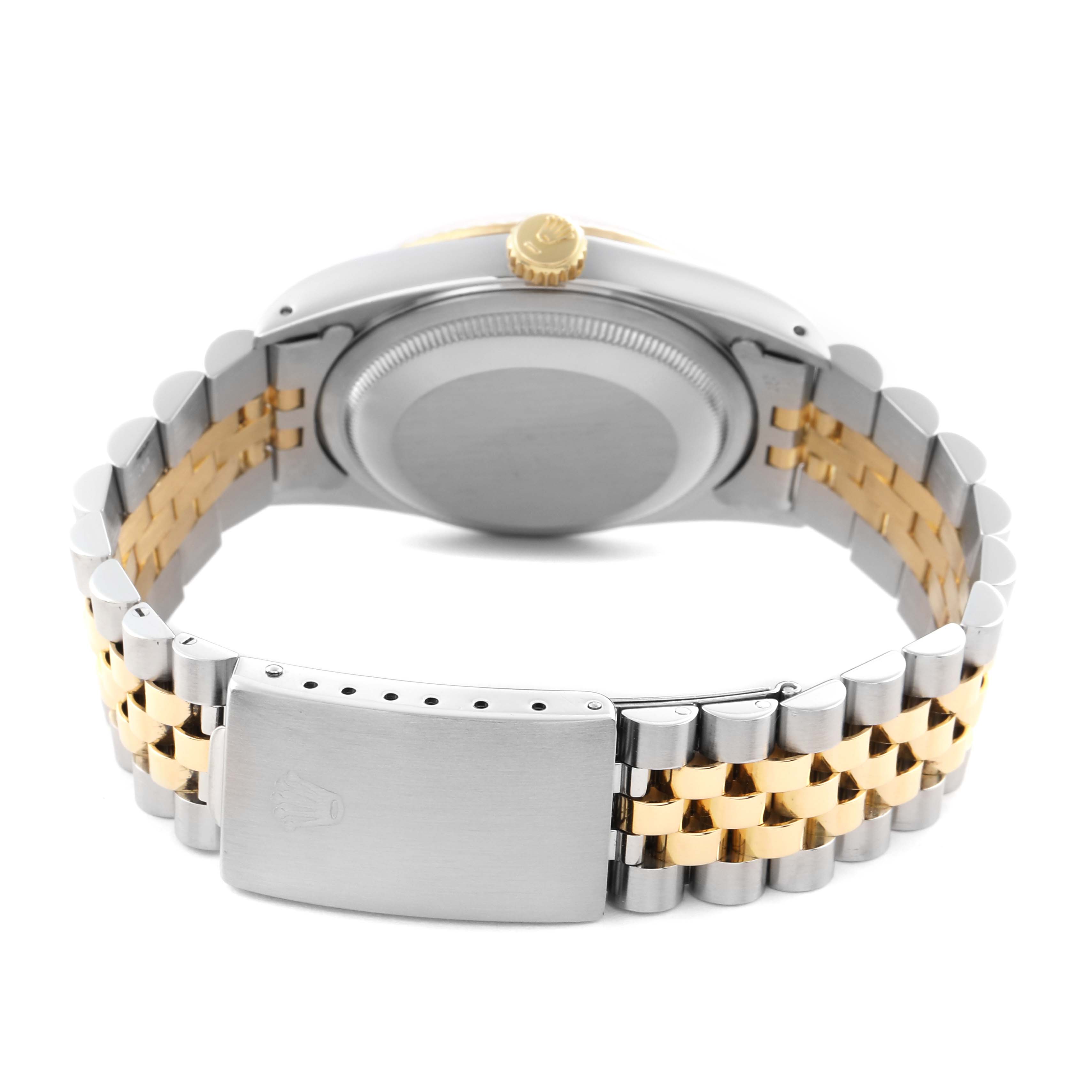 The image shows the back view of a Rolex Datejust 16233 Men's Steel and Gold (two tone) Silver Dial 16233 Men's Steel and Gold (two tone) Silver Dial, highlighting the case back, crown, and two-tone bracelet clasp.