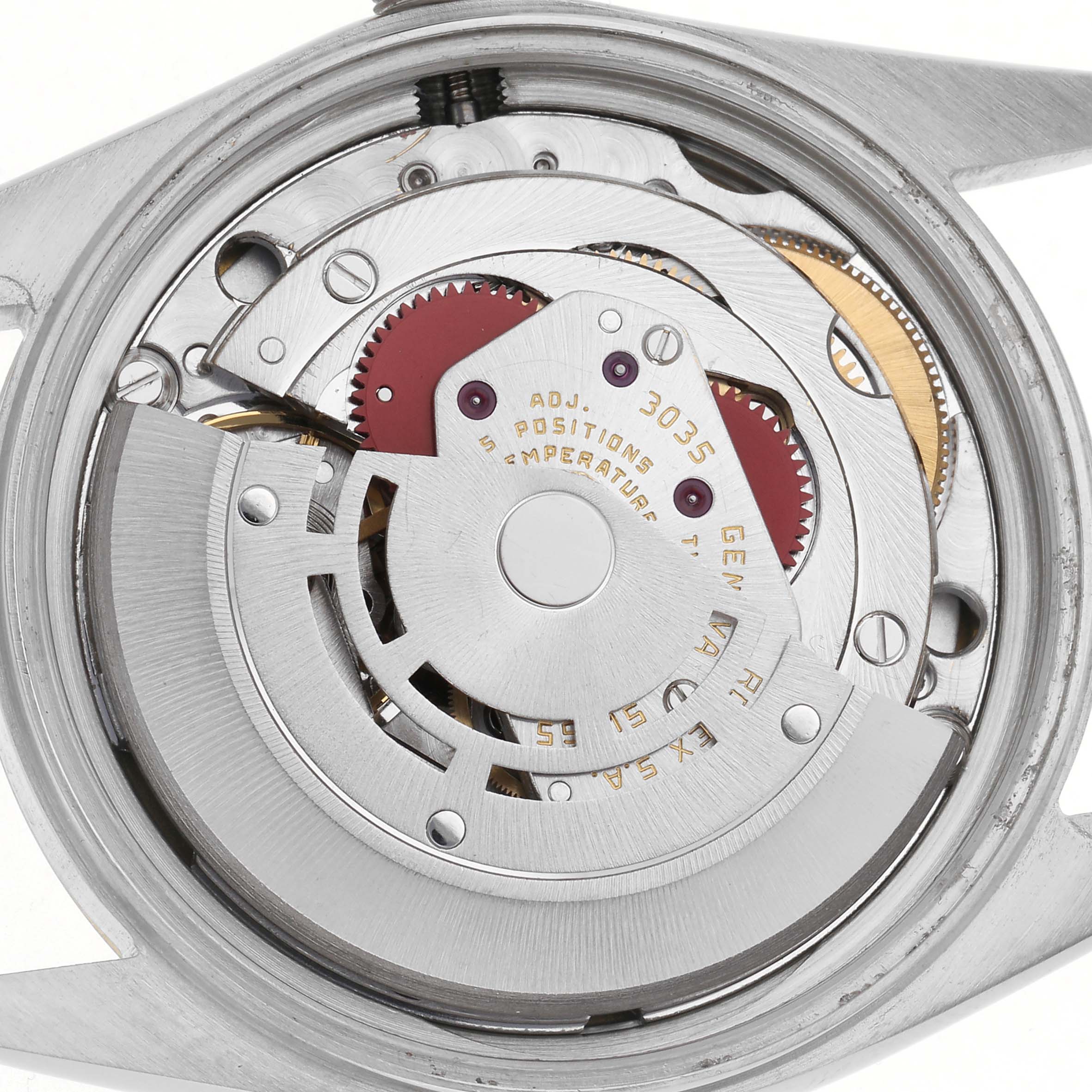 This image shows the movement of a Rolex Datejust 16013 Men's Steel and Gold (two tone) White Dial 16013 Men's Steel and Gold (two tone) White Dial watch from a top-down angle, revealing intricate gears and components.