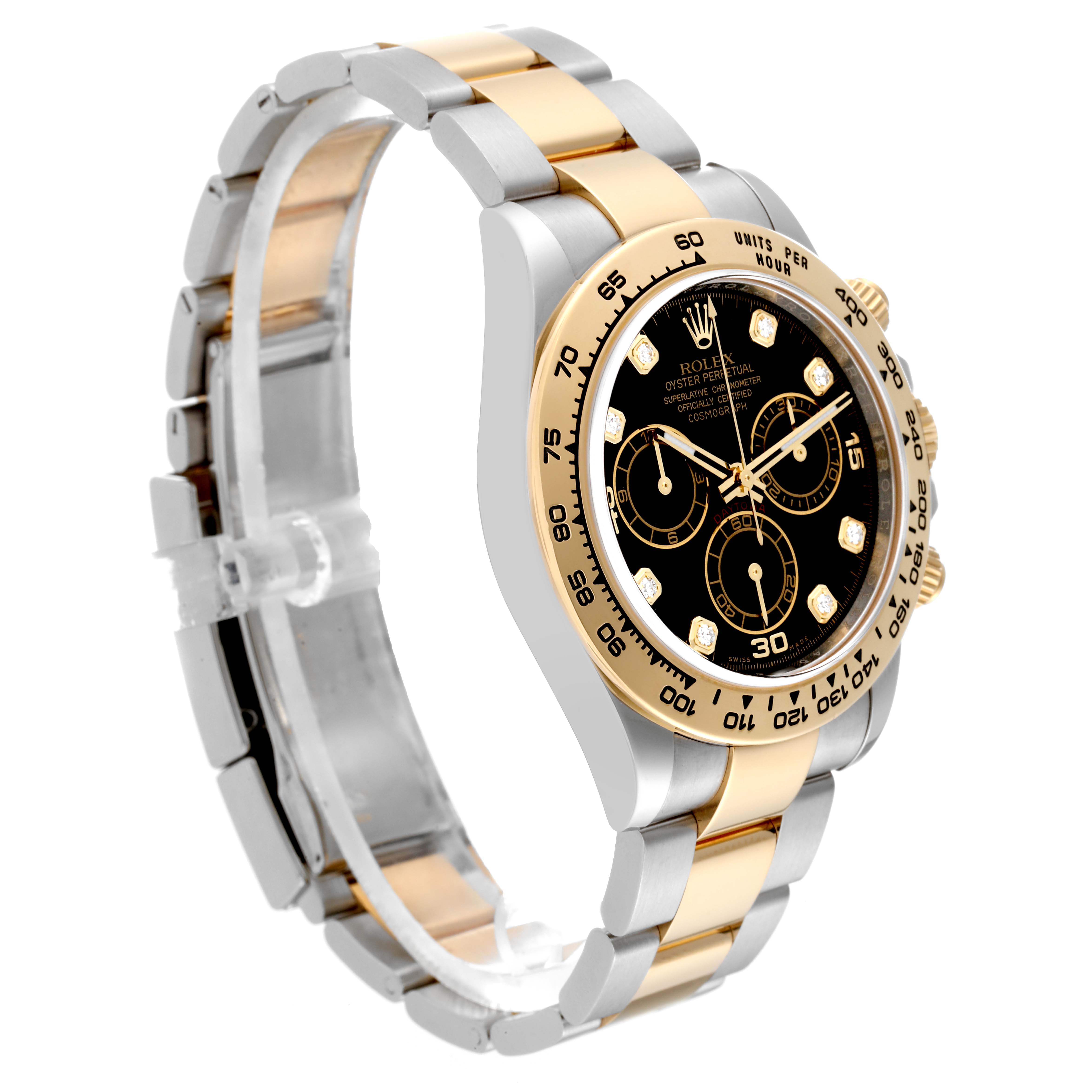 This image shows a side angle of a Rolex Daytona 116503 Men's Steel and Gold (two tone) Black Dial 116503 Men's Steel and Gold (two tone) Black Dial, highlighting its black dial, gold bezel, and two-tone bracelet.