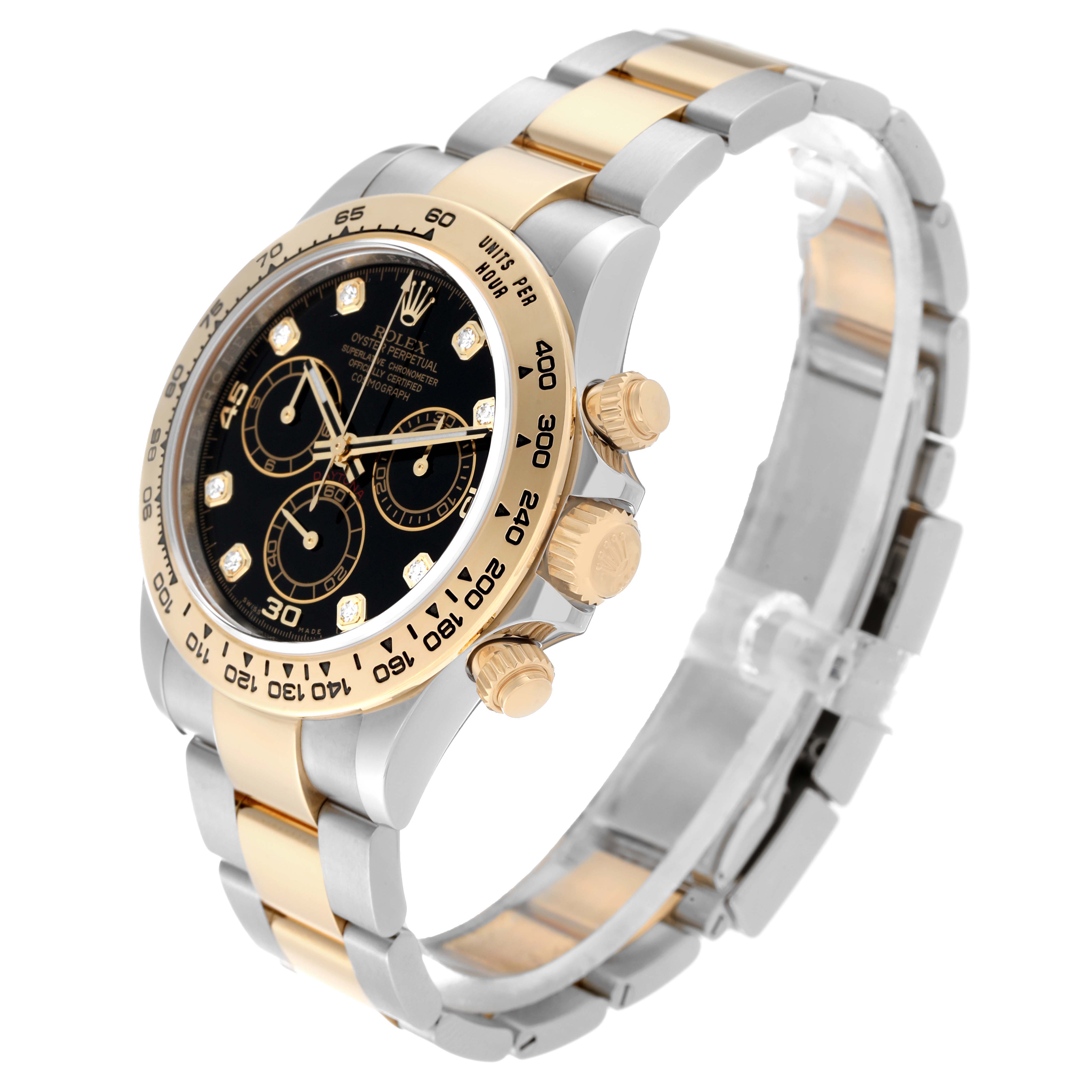 The Rolex Daytona 116503 Men's Steel and Gold (two tone) Black Dial 116503 Men's Steel and Gold (two tone) Black Dial watch is shown in a three-quarter angle, displaying the dial, bezel, buttons, and part of the bracelet.