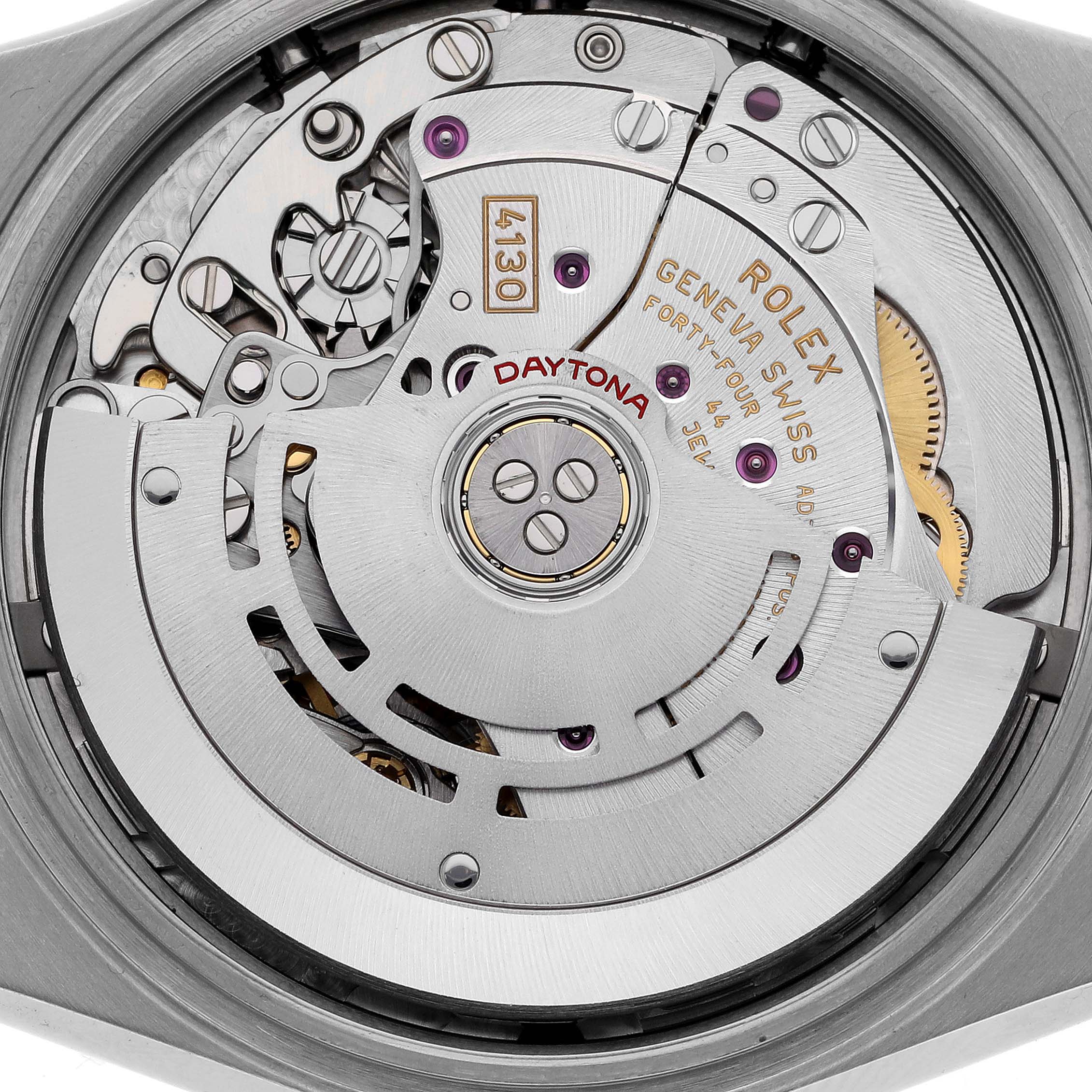 This image shows a close-up view of the movement of a Rolex Daytona 116503 Men's Steel and Gold (two tone) Mother of Pearl Dial 116503 Men's Steel and Gold (two tone) Mother of Pearl Dial watch, highlighting its intricate internal mechanics.