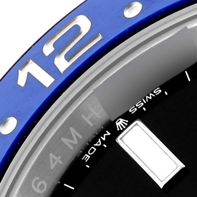 The image shows a close-up of the bezel and part of the dial of a Rolex GMT-Master 126710 Men
s Stainless Steel Black Dial 126710 Men
s Stainless Steel Black Dial watch, with the "12" marker prominently visible.