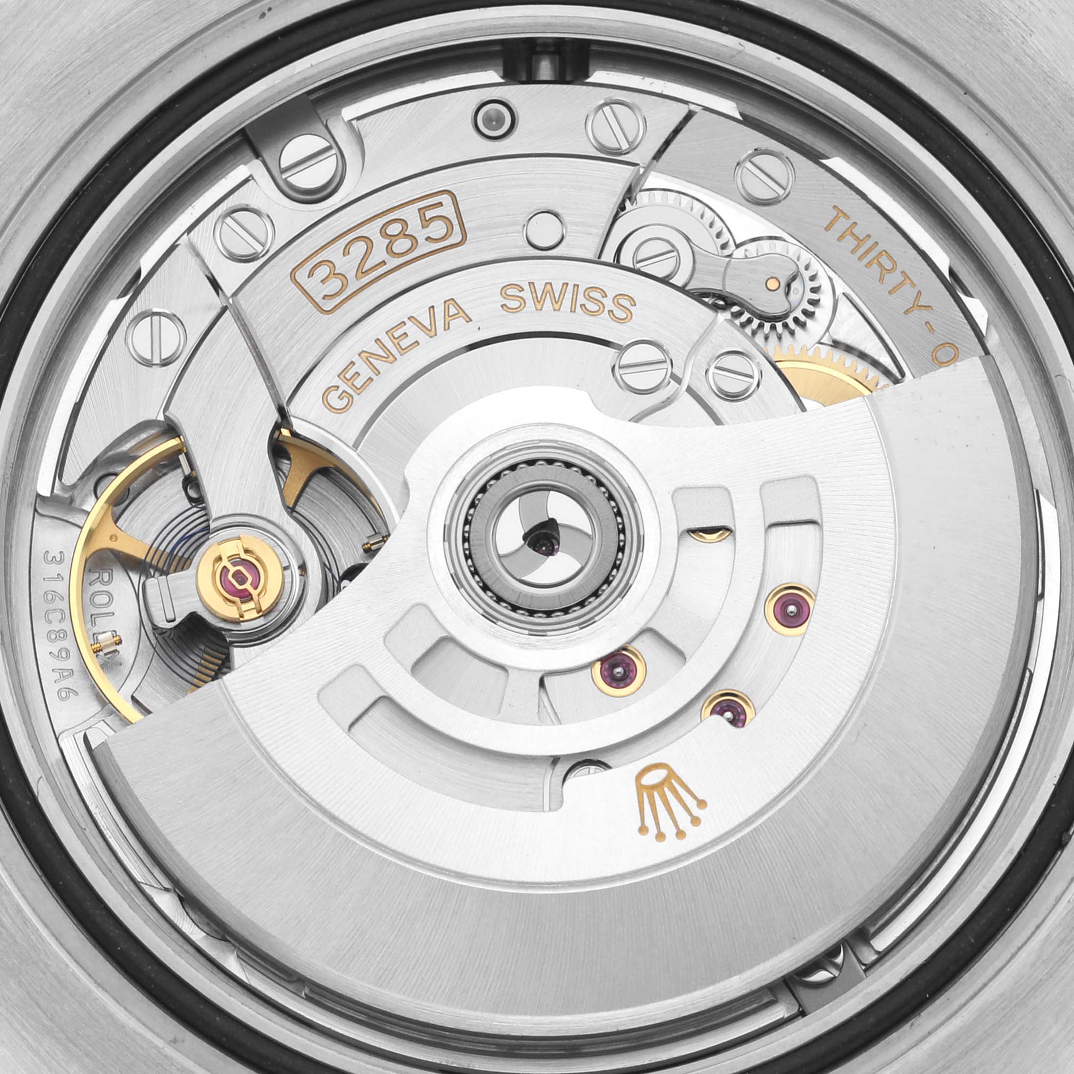 The image shows a close-up of the movement mechanism from the back of a Rolex GMT-Master 126710 Men
s Stainless Steel Black Dial 126710 Men
s Stainless Steel Black Dial watch.