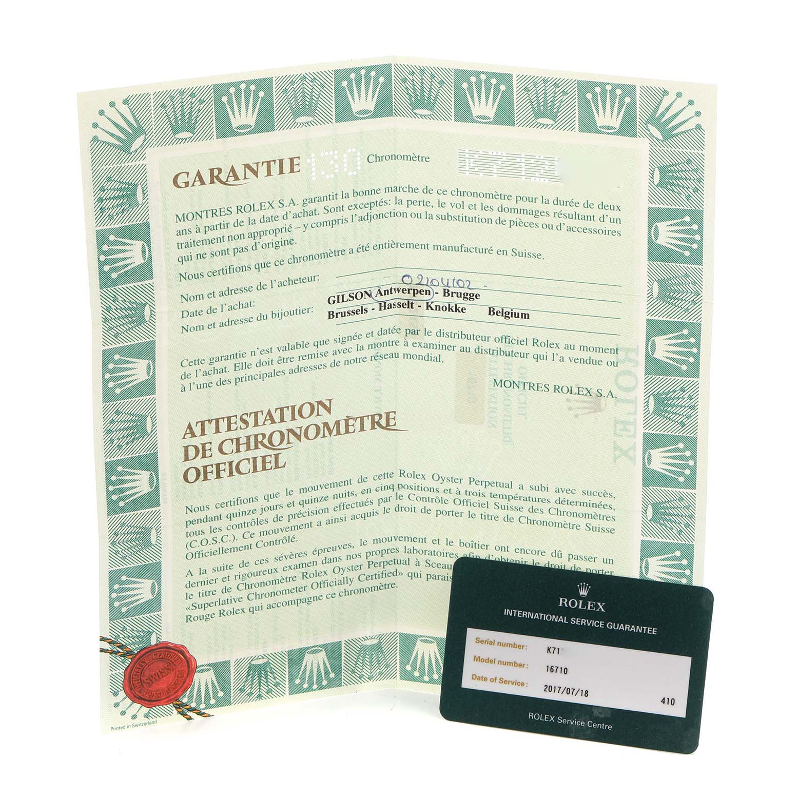 The image shows a Rolex GMT-Master 16710 Men's Stainless Steel Black Dial 16710 Men's Stainless Steel Black Dial warranty certificate and service card, laid flat and viewed from above.