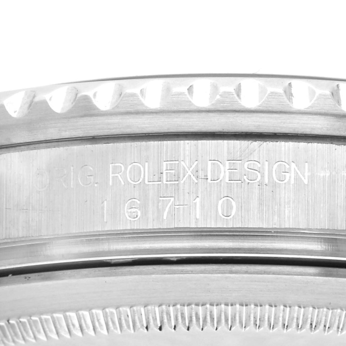 The image shows a close-up of the side bezel engraving on the Rolex GMT-Master 16710 Men's Stainless Steel Black Dial 16710 Men's Stainless Steel Black Dial, model 16710.