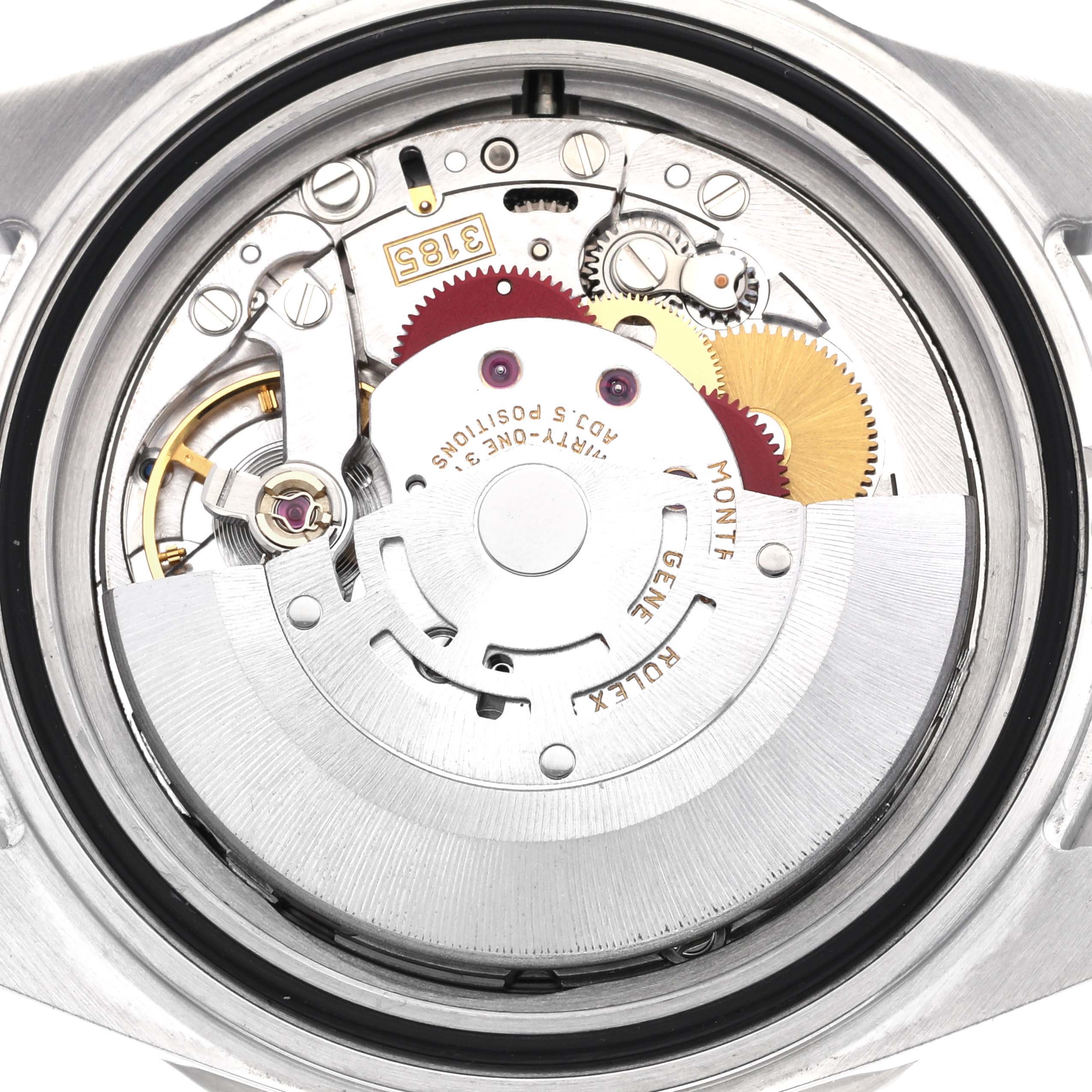The image shows the movement inside a Rolex GMT-Master 16710 Men's Stainless Steel Black Dial 16710 Men's Stainless Steel Black Dial watch, with gears and the rotor visible from a top-down angle.