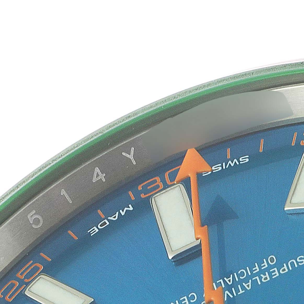 This close-up image shows a partial view of the Rolex Milgauss 116400GV Men
s Stainless Steel Blue Dial 116400GV Men
s Stainless Steel Blue Dial watch face, featuring the orange seconds hand and part of the blue dial.