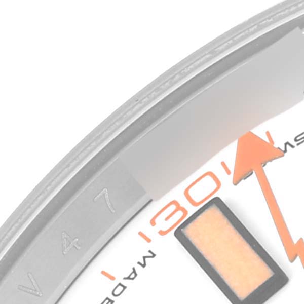 This image shows a close-up of the dial of the Rolex Milgauss 116400 Men's Stainless Steel White Dial 116400 Men's Stainless Steel White Dial watch, focusing on the 30-second marker and orange lightning bolt hand.