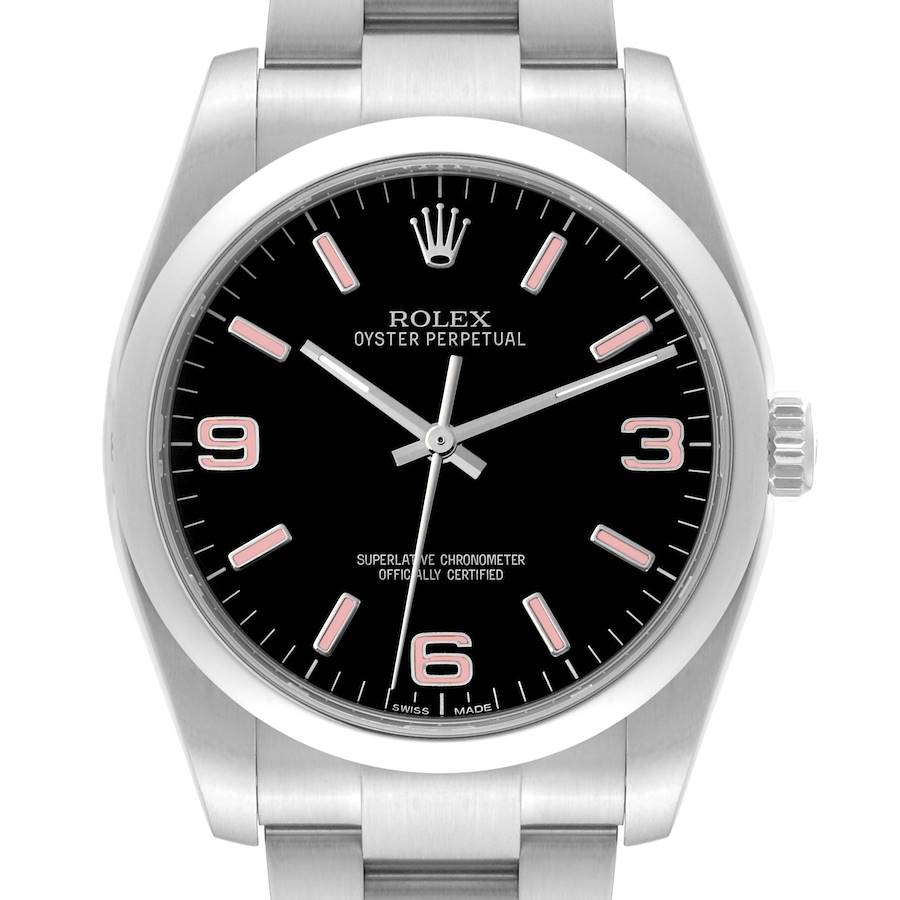 The image shows a front view of a Rolex Oyster Perpetual watch, highlighting its black dial, hour markers, hands, and part of the bracelet.