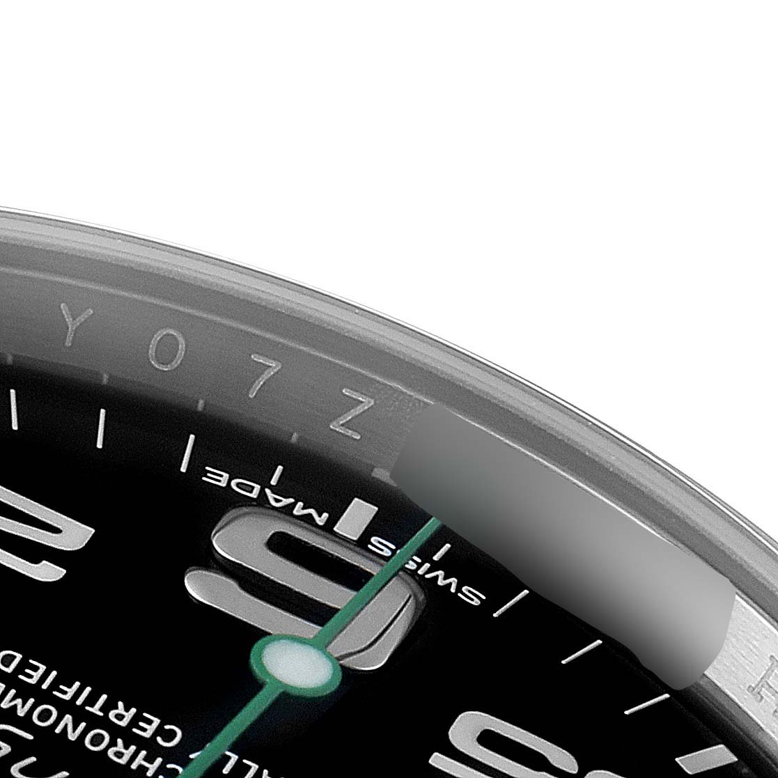 The image shows a close-up of the dial and bezel with numerals of the Rolex Air-King 116900 Men's Stainless Steel Black Dial 116900 Men's Stainless Steel Black Dial watch.