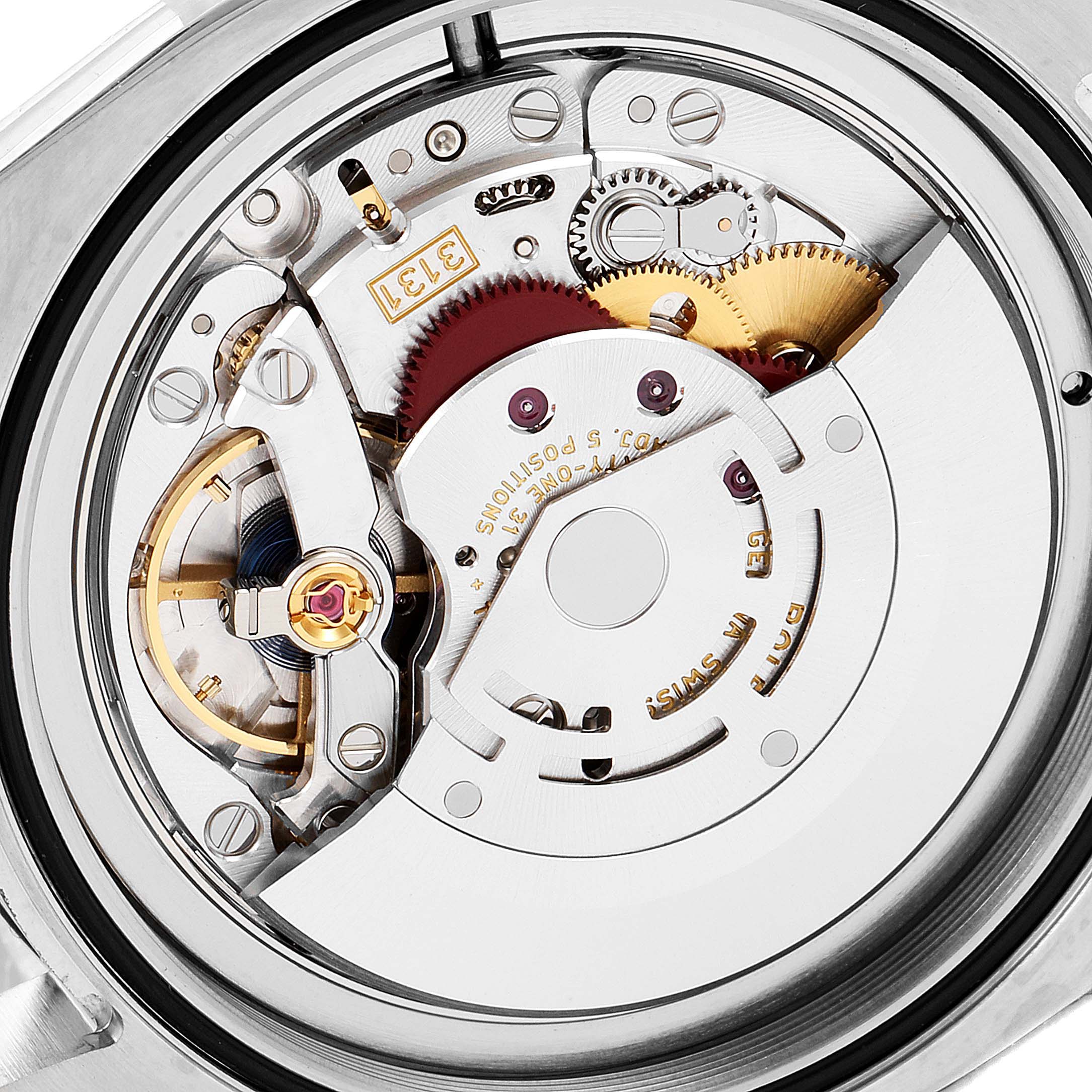 The image shows a close-up view of the movement and internal mechanisms of the Rolex Air-King 116900 Men's Stainless Steel Black Dial 116900 Men's Stainless Steel Black Dial watch.