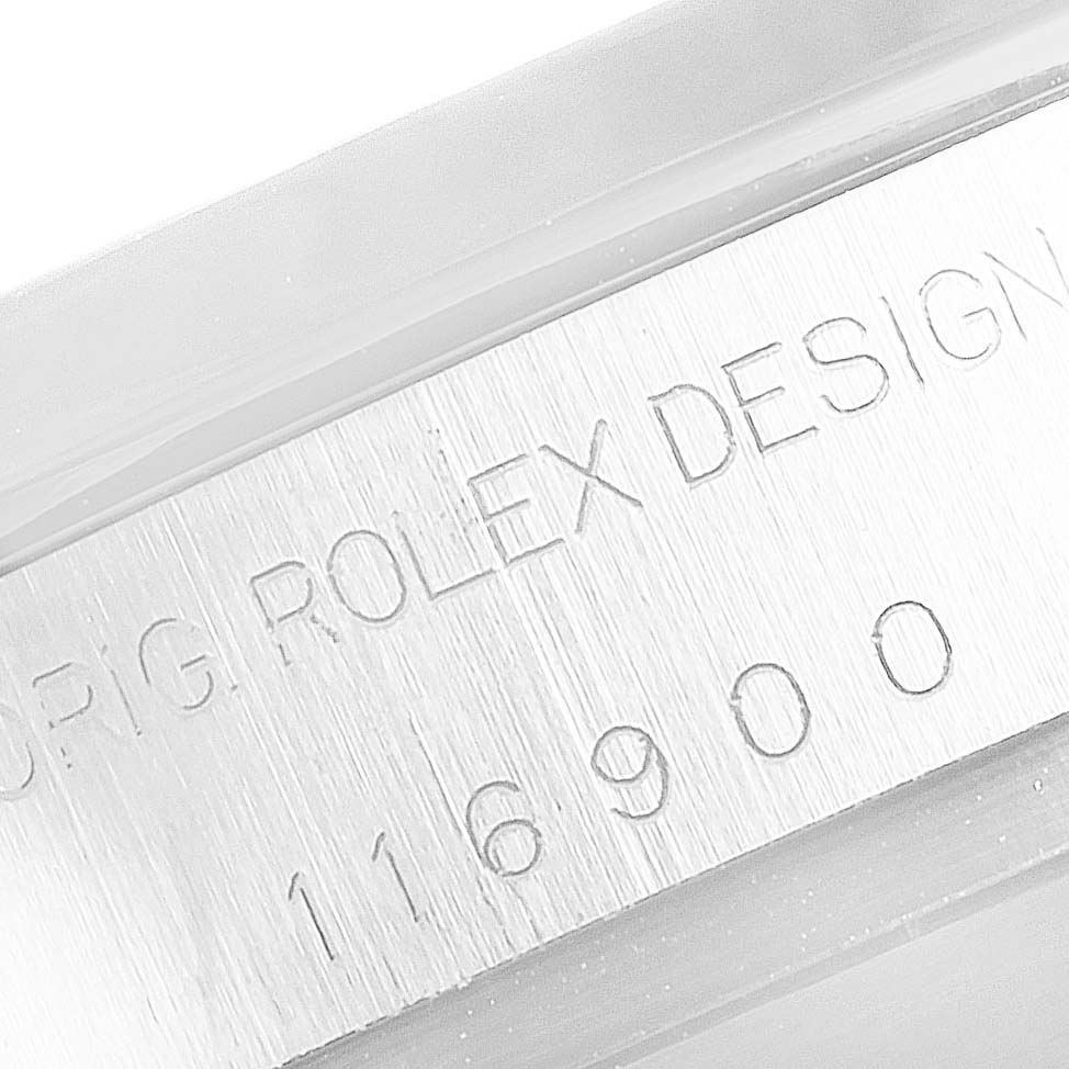 This close-up image shows the side of the Rolex Air-King 116900 Men's Stainless Steel Black Dial 116900 Men's Stainless Steel Black Dial model, displaying its model number "116900" and the engraving "ORIG ROLEX DESIGN."