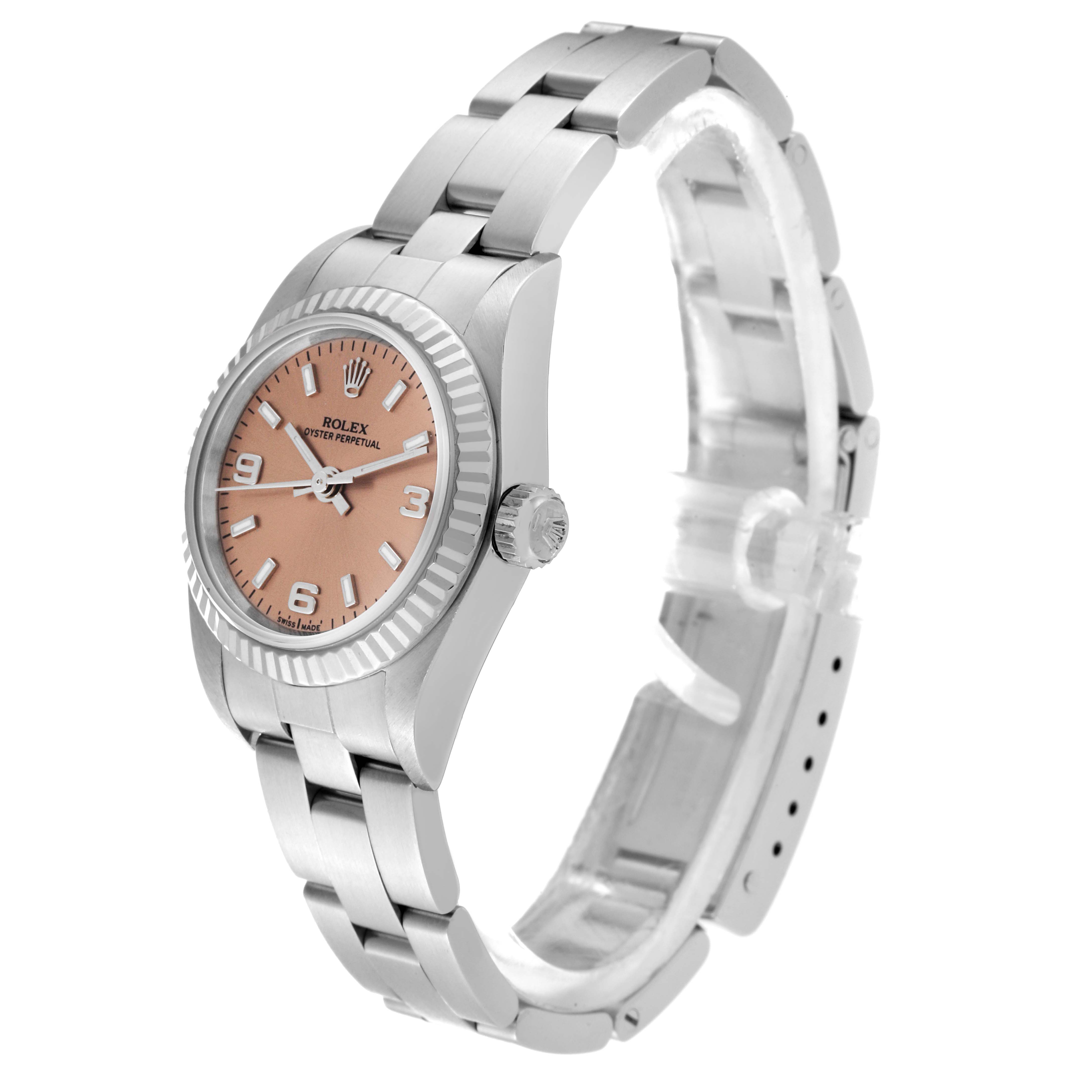 The image shows a side angle of a Rolex Oyster Perpetual 76094 Women's Stainless Steel Pink Dial 76094 Women's Stainless Steel Pink Dial watch, highlighting the crown, bezel, case, and bracelet.