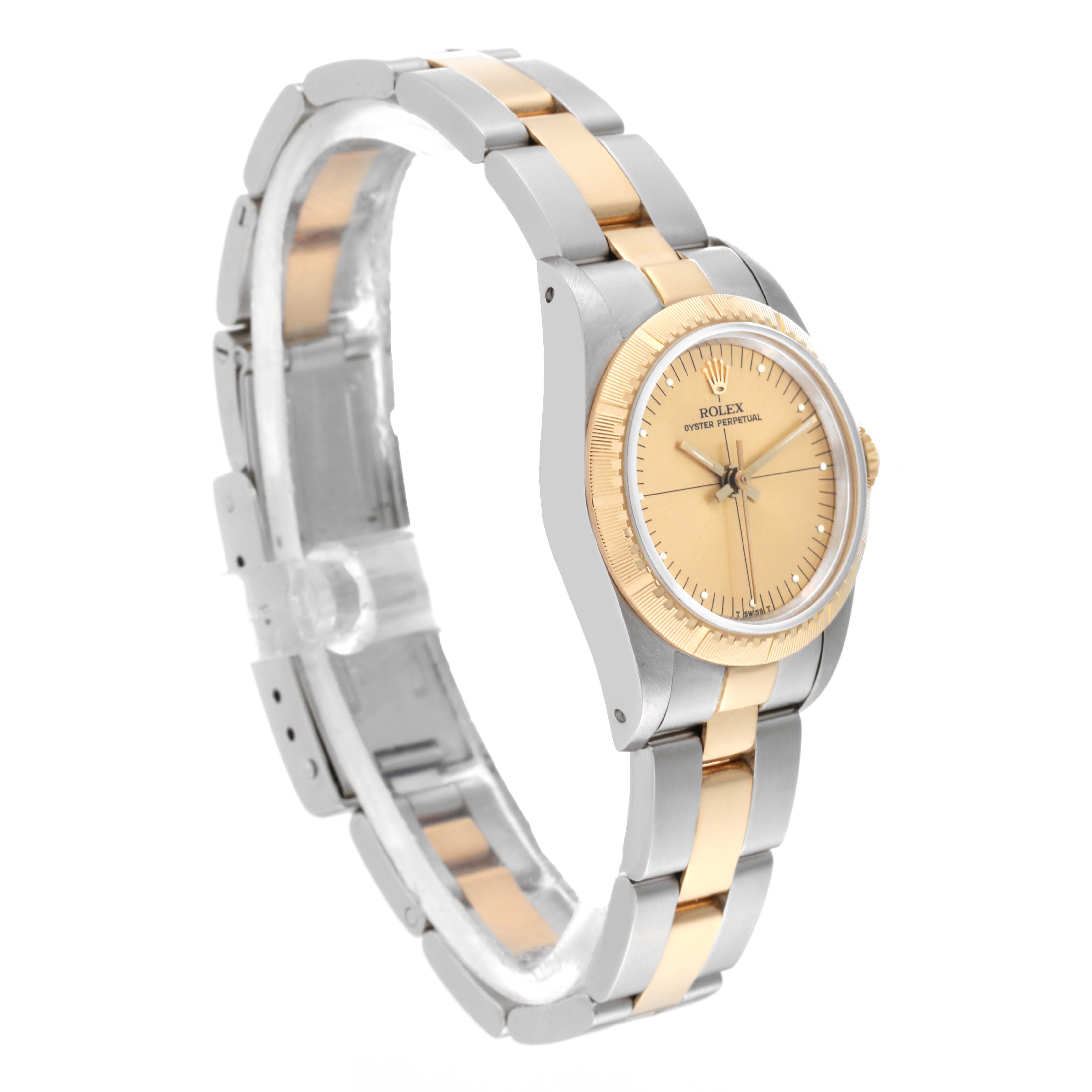 This image shows a Rolex Oyster Perpetual 67243 Women's Steel and Gold (two tone) Champagne Dial 67243 Women's Steel and Gold (two tone) Champagne Dial watch captured at a three-quarter angle, highlighting its gold and silver bracelet and face.