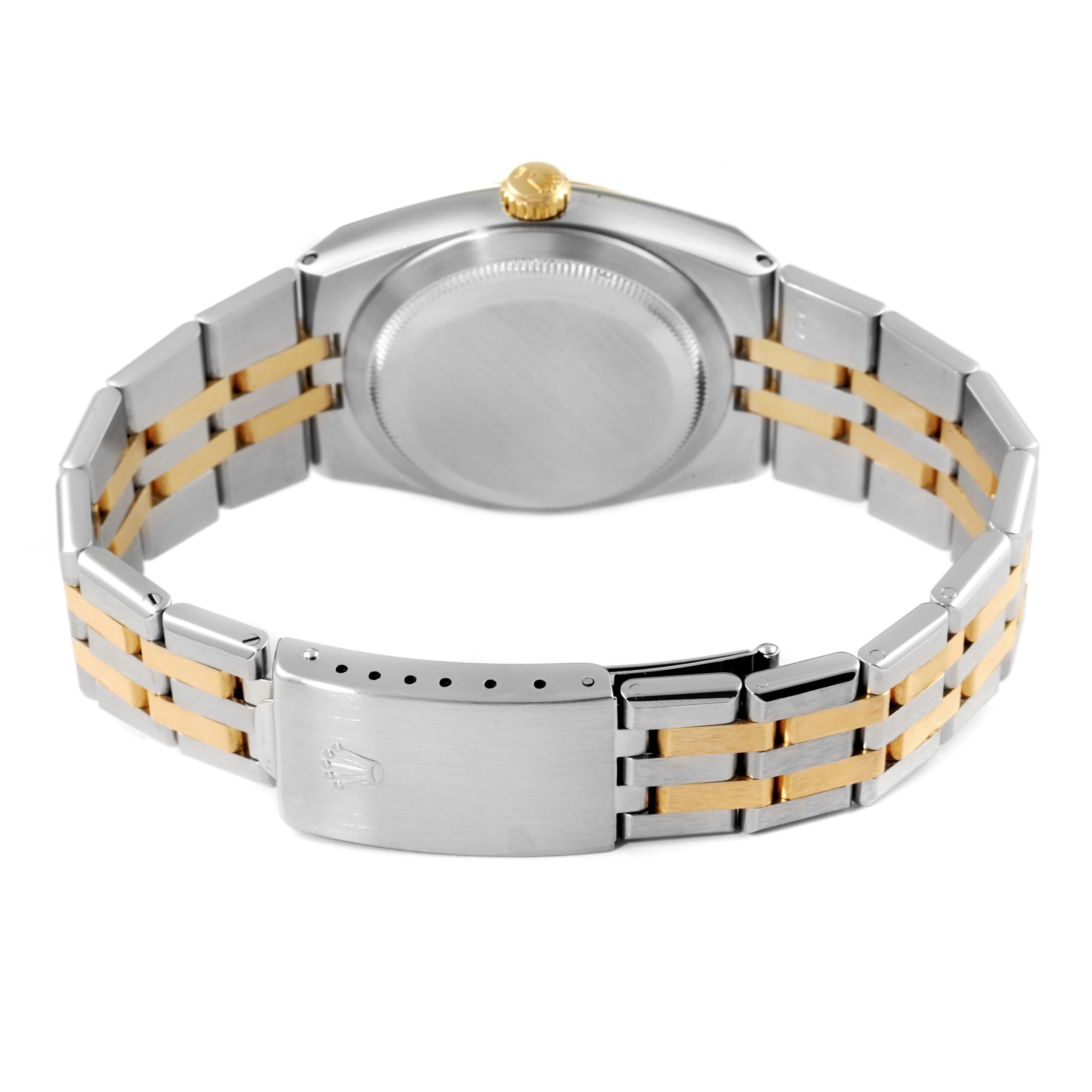 This image shows the back and bracelet of the Rolex Oysterquartz 17013 Men's Steel and Gold (two tone) Champagne Dial 17013 Men's Steel and Gold (two tone) Champagne Dial watch, emphasizing the two-tone metal finish.