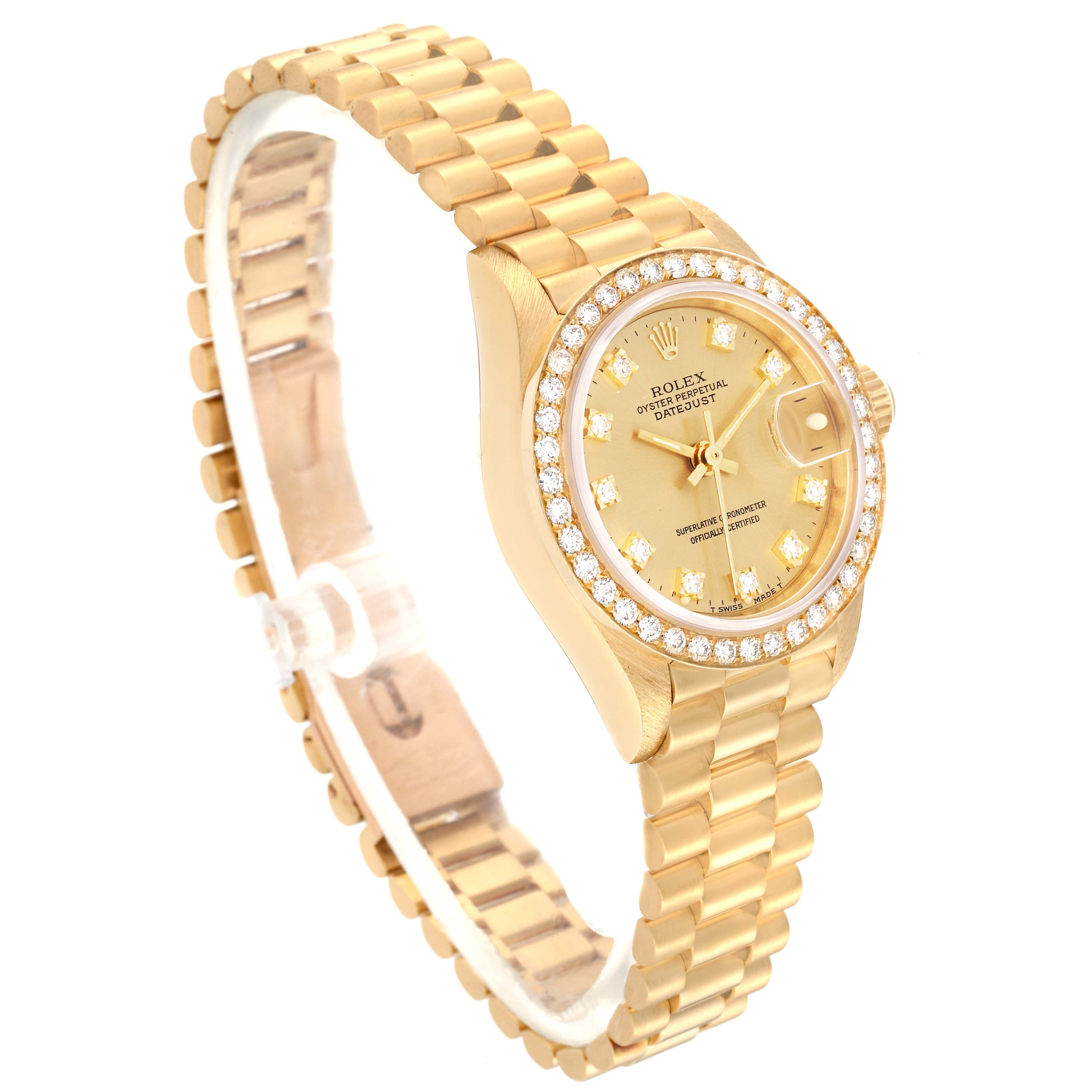 The Rolex President 69138 Women
s Yellow Gold Champagne Dial 69138 Women
s Yellow Gold Champagne Dial model watch is shown at an angle displaying its gold band, bezel, and dial with diamond accents.