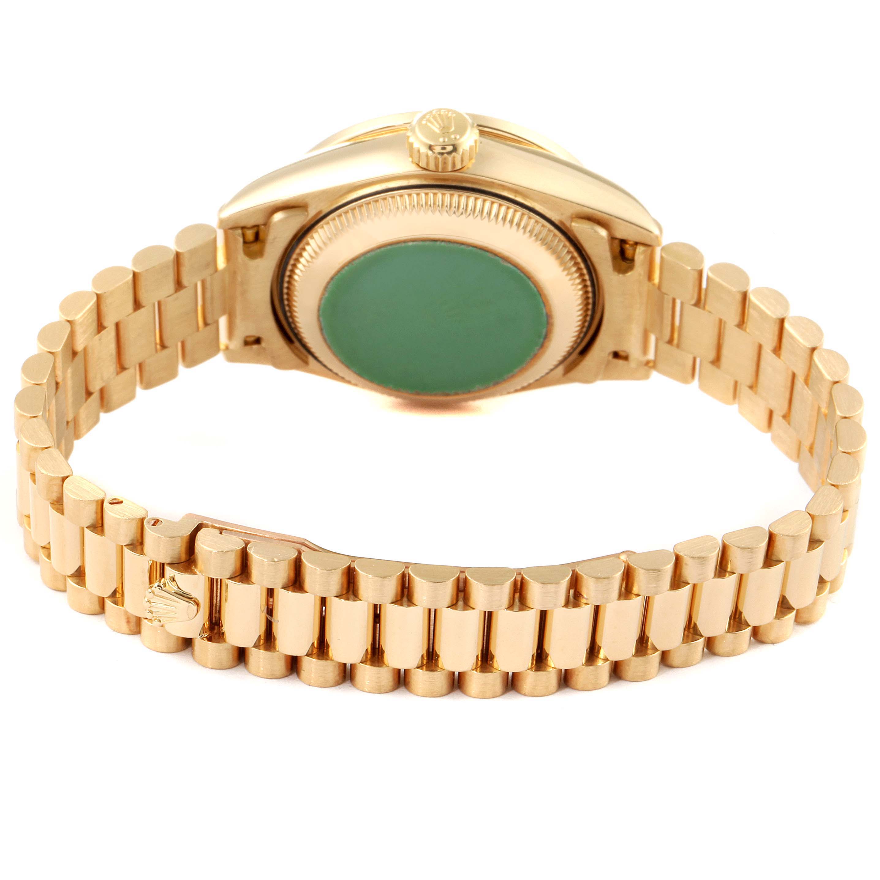 The image shows the back case and bracelet of a Rolex President 79138 Women
s Yellow Gold Champagne Dial 79138 Women
s Yellow Gold Champagne Dial model watch, showcasing its gold finish and signature crown logo.