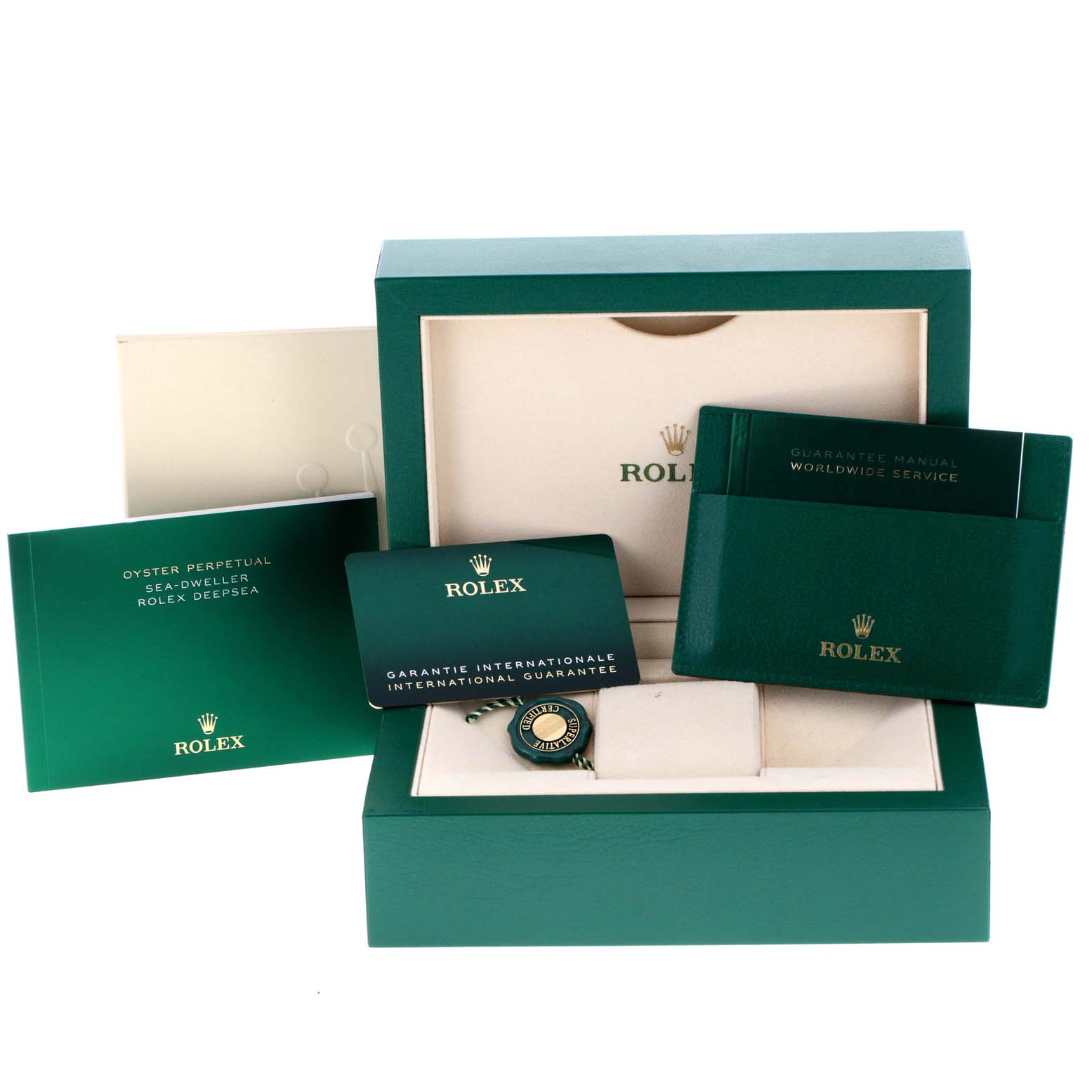 The angle shows the accessories for the Rolex Sea-Dweller 126660 Men
s Stainless Steel Blue Dial 126660 Men
s Stainless Steel Blue Dial, including the box, manuals, guarantee card, and tag.