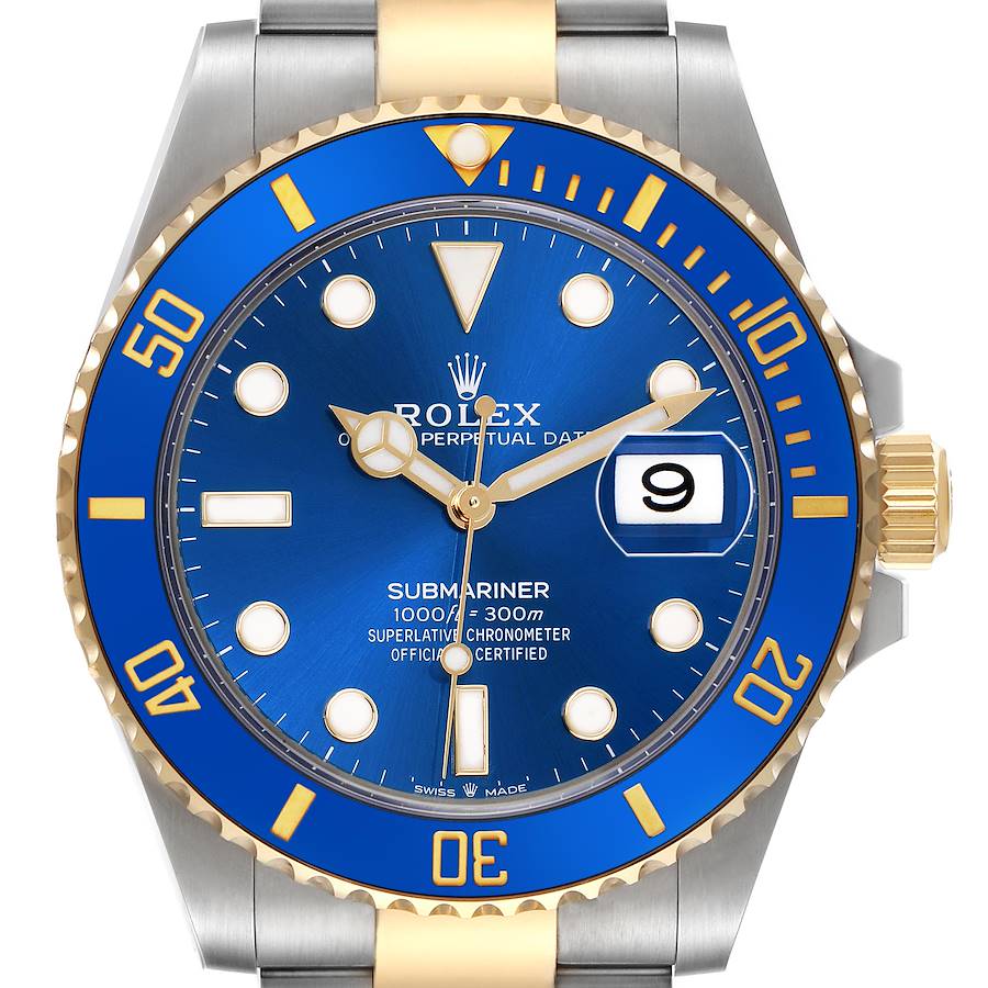 The Rolex Submariner watch is shown from the front, highlighting the blue dial, bezel, and its two-tone bracelet.