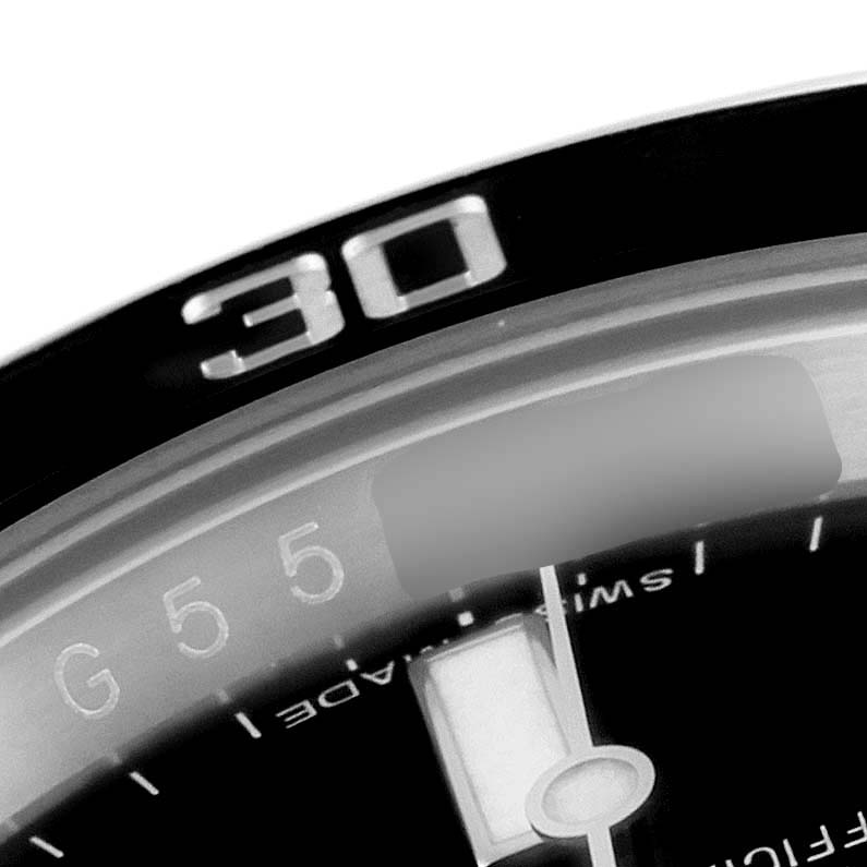 The close-up image shows the bezel and part of the dial of a Rolex Submariner 116610LN Men
s Stainless Steel Black Dial 116610LN Men
s Stainless Steel Black Dial watch, specifically the "30" minute marker.