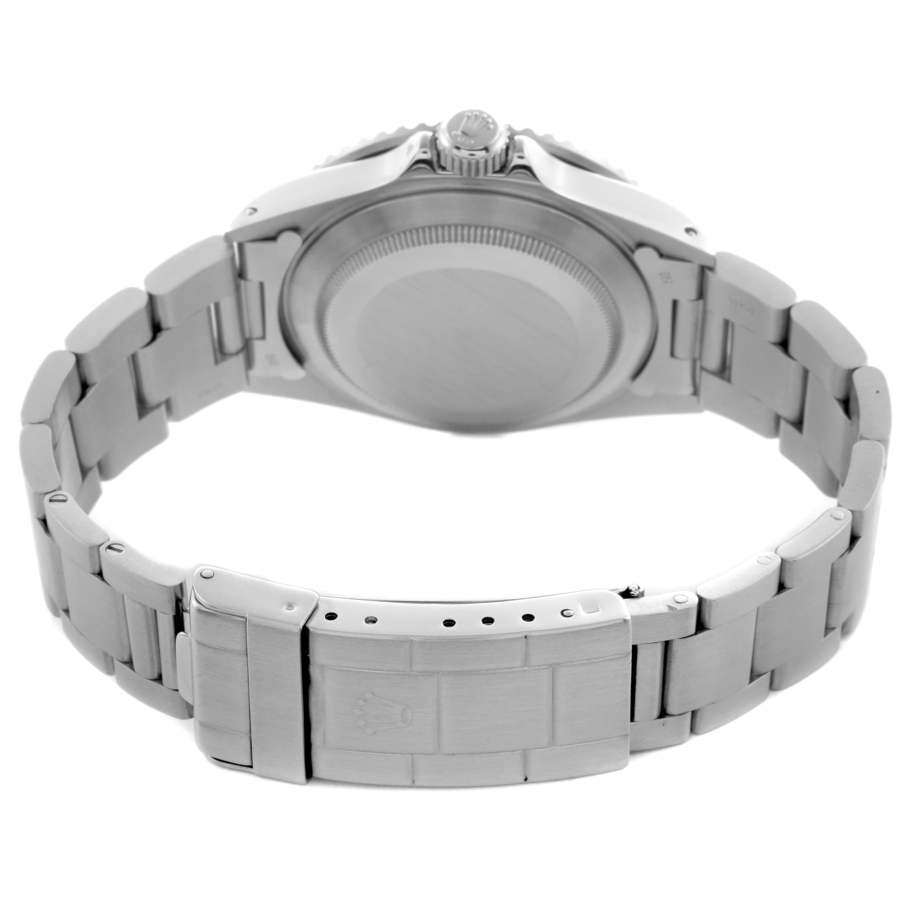 The image shows the back view of a Rolex Submariner 168000 Men
s Stainless Steel Black Dial 168000 Men
s Stainless Steel Black Dial, highlighting the case back, bracelet, and clasp.