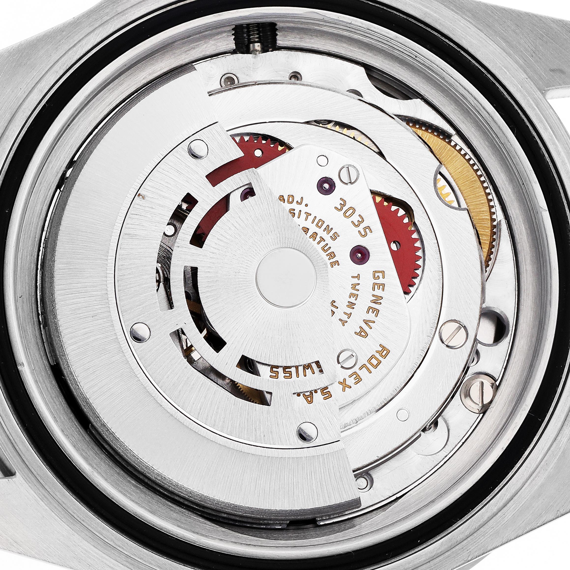 The image shows the movement mechanism of a Rolex Submariner 168000 Men
s Stainless Steel Black Dial 168000 Men
s Stainless Steel Black Dial, viewed from the back with visible gears and inscriptions.