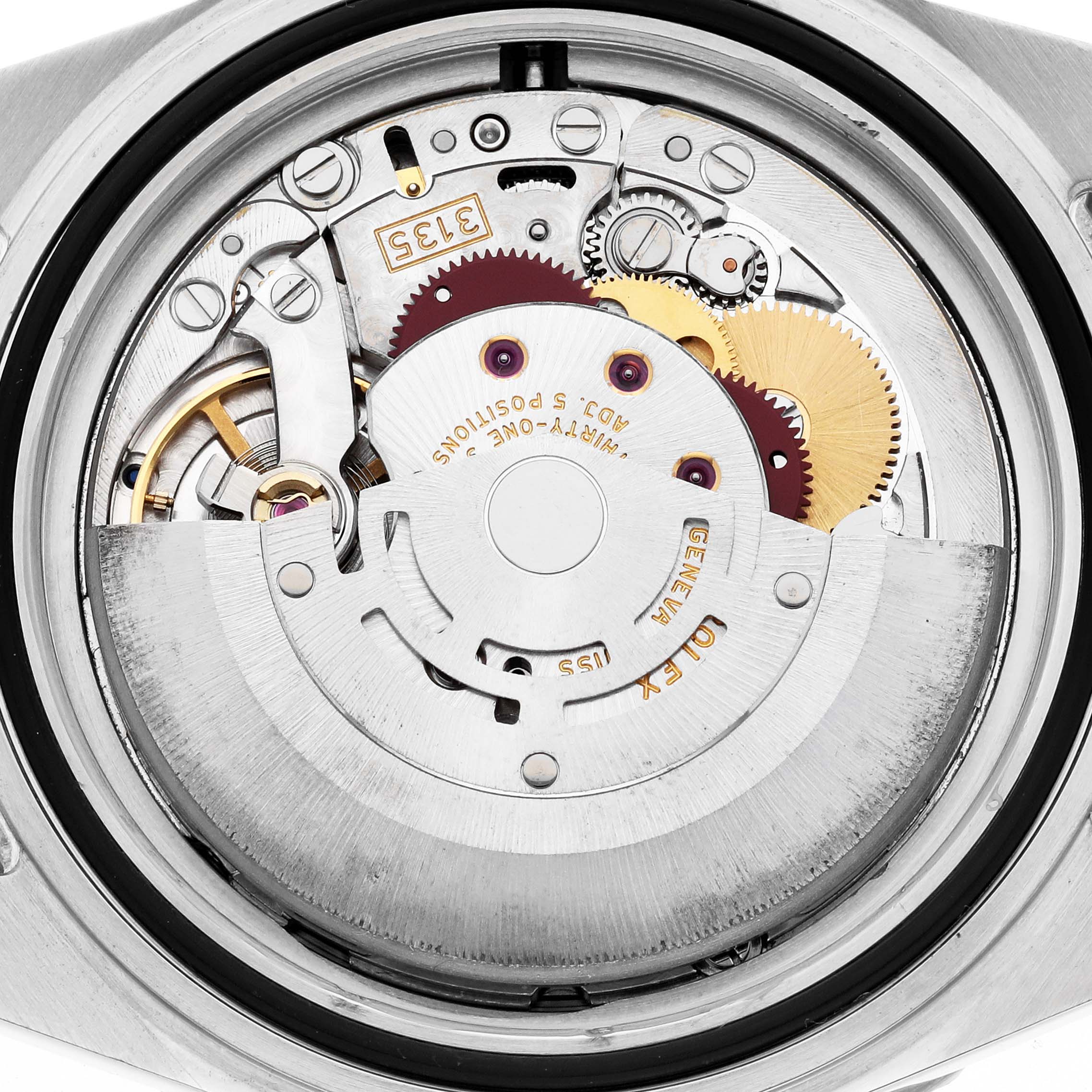 The image shows the movement of the Rolex Submariner 16610 Men's Stainless Steel Black Dial 16610 Men's Stainless Steel Black Dial watch from a close-up, top-down angle, highlighting its intricate internal components.