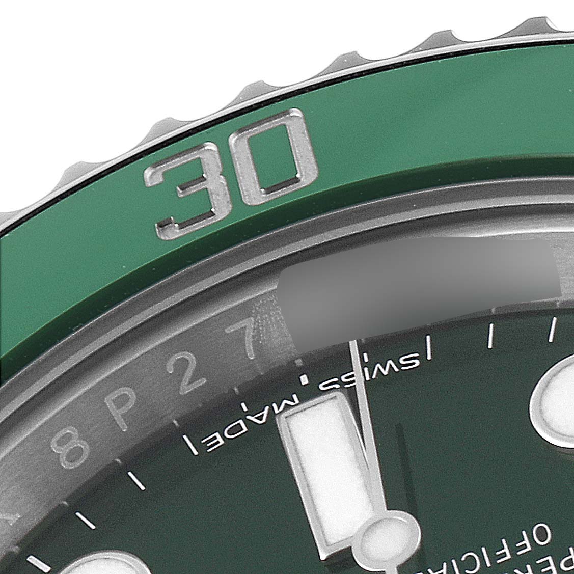 This image shows a close-up of the green bezel, minute track, and part of the dial of the Rolex Submariner 116610LV Men
s Stainless Steel Green Dial 116610LV Men
s Stainless Steel Green Dial watch.