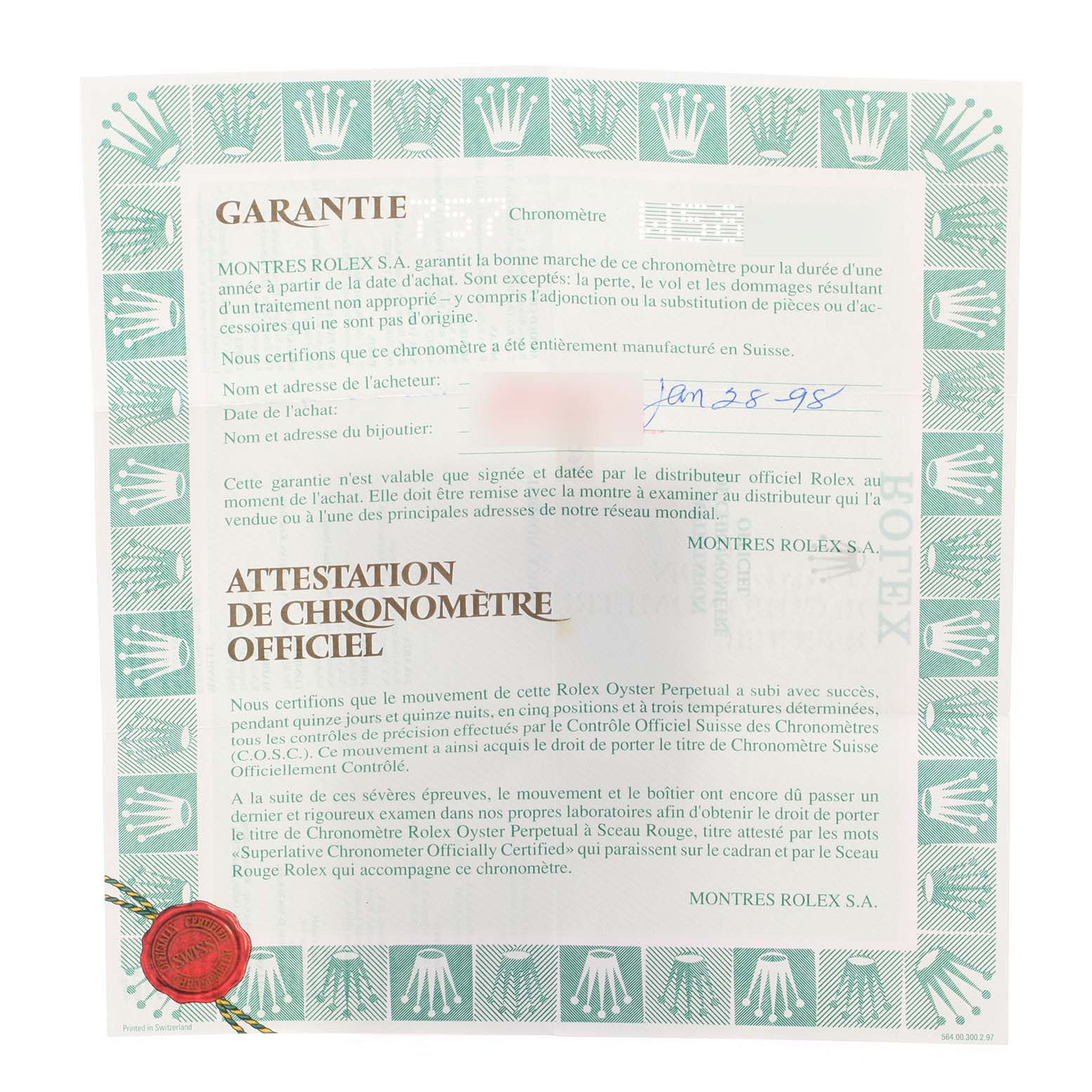 The image shows a warranty certificate for the Rolex Yacht-Master 69628 Women's Yellow Gold Blue Dial 69628 Women's Yellow Gold Blue Dial watch, viewed from above.