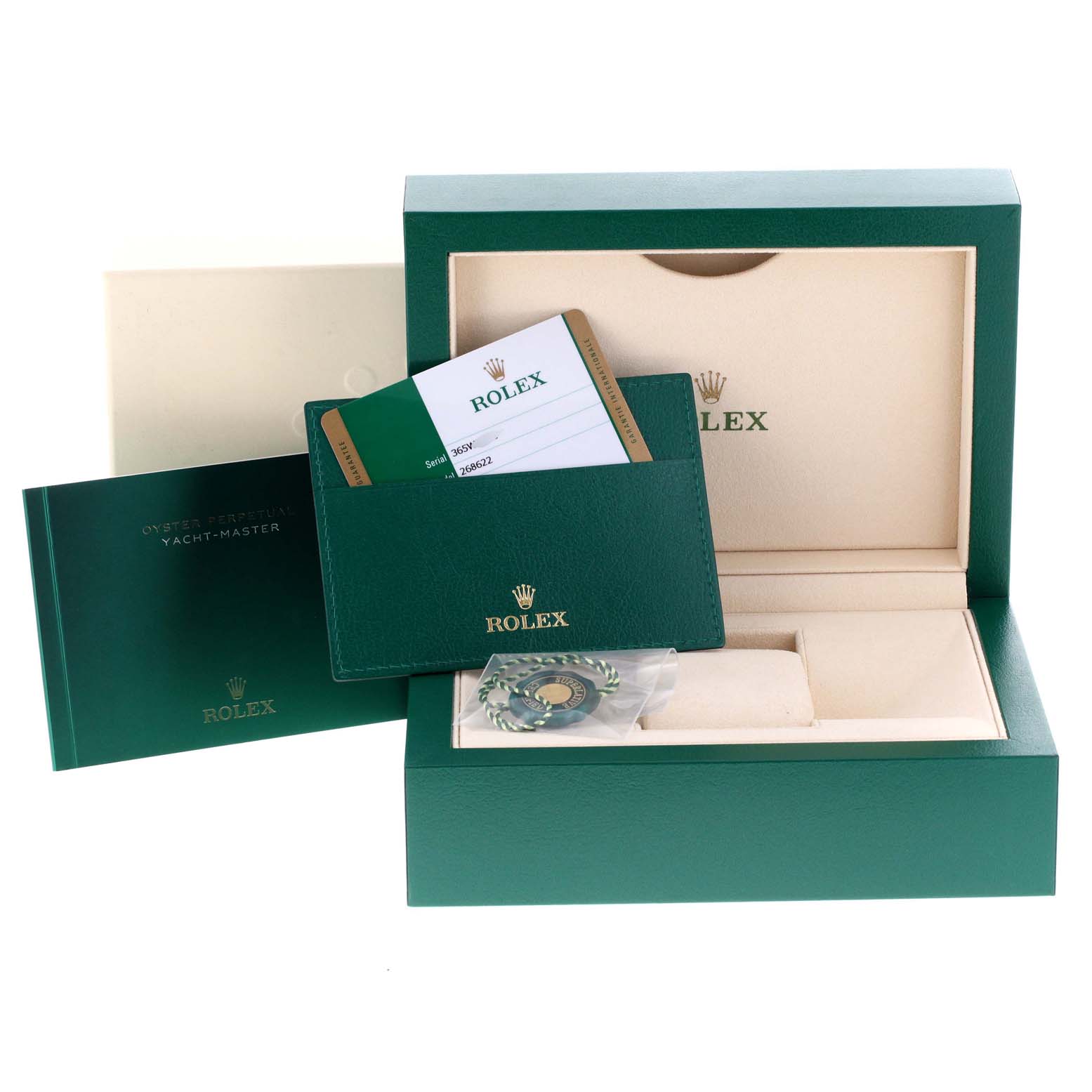 The image shows a Rolex Yacht-Master 268622 Men's Stainless Steel Grey Dial 268622 Men's Stainless Steel Grey Dial watch box, warranty card, booklet, and an accessory tag.
