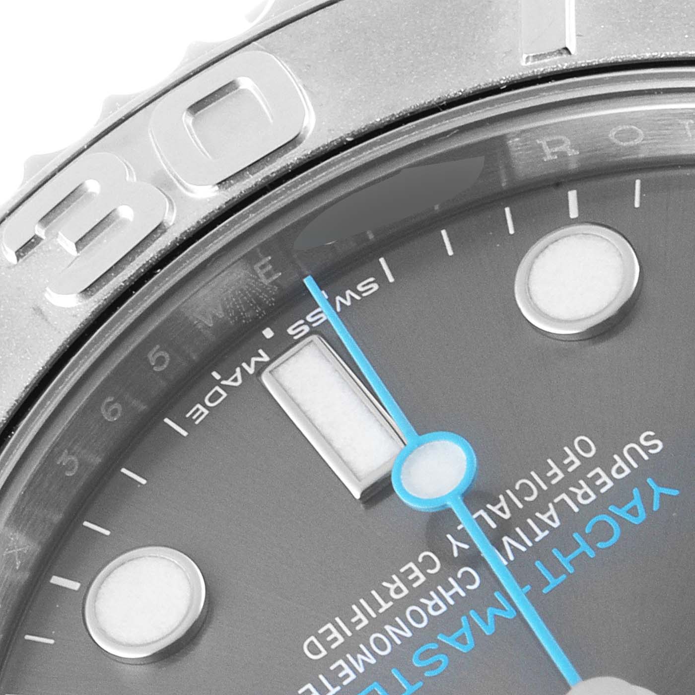 This image shows a close-up angle of the Rolex Yacht-Master 268622 Men's Stainless Steel Grey Dial 268622 Men's Stainless Steel Grey Dial watch's dial and part of its bezel.