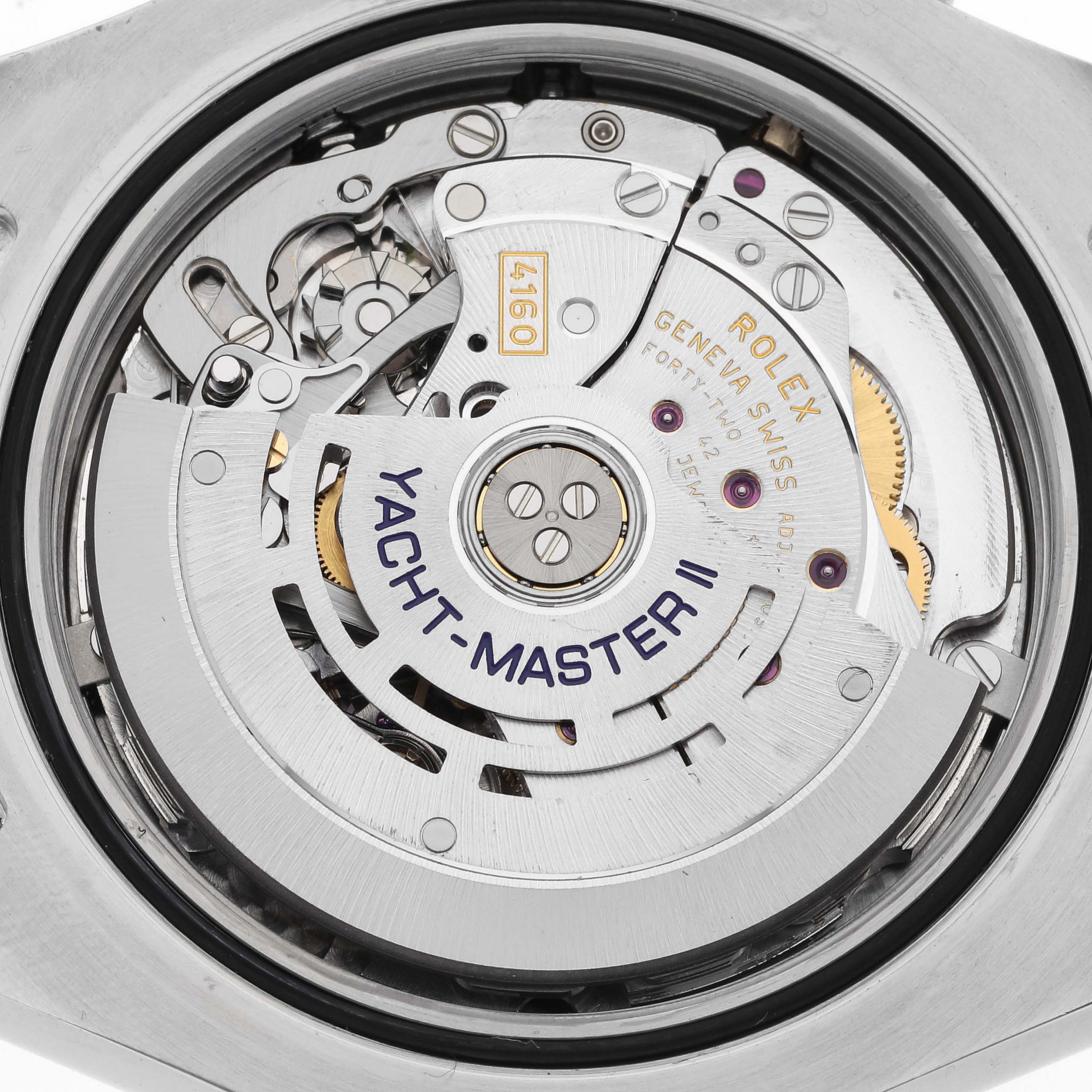 The image shows the movement mechanism of a Rolex Yacht-Master 116681 Men's Steel and Gold (two tone) White Dial 116681 Men's Steel and Gold (two tone) White Dial II watch at a close-up angle.