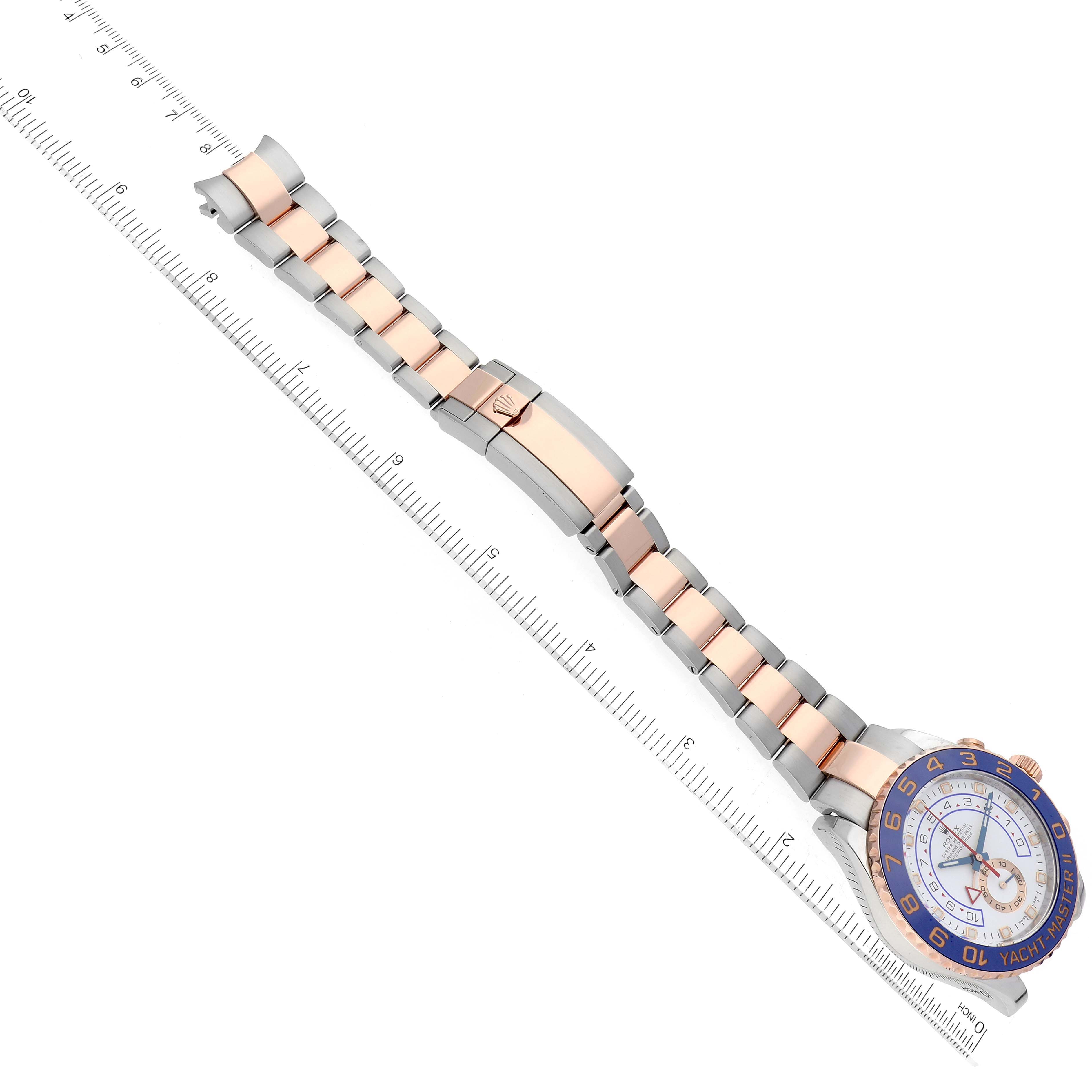 This image shows a Rolex Yacht-Master 116681 Men's Steel and Gold (two tone) White Dial 116681 Men's Steel and Gold (two tone) White Dial model watch from a top-down angle, featuring the face and bracelet.