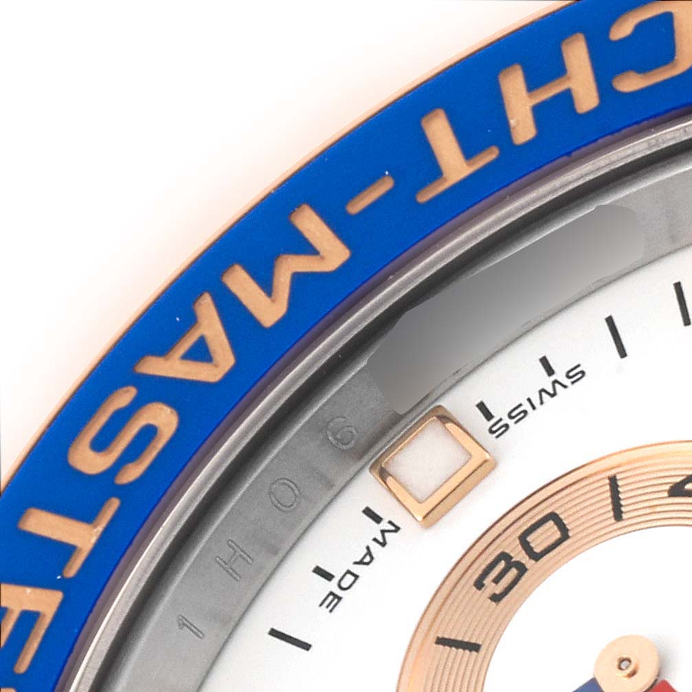 This image shows a close-up of the bezel and partial dial of a Rolex Yacht-Master 116681 Men's Steel and Gold (two tone) White Dial 116681 Men's Steel and Gold (two tone) White Dial watch, highlighting the "YACHT-MASTER" text.