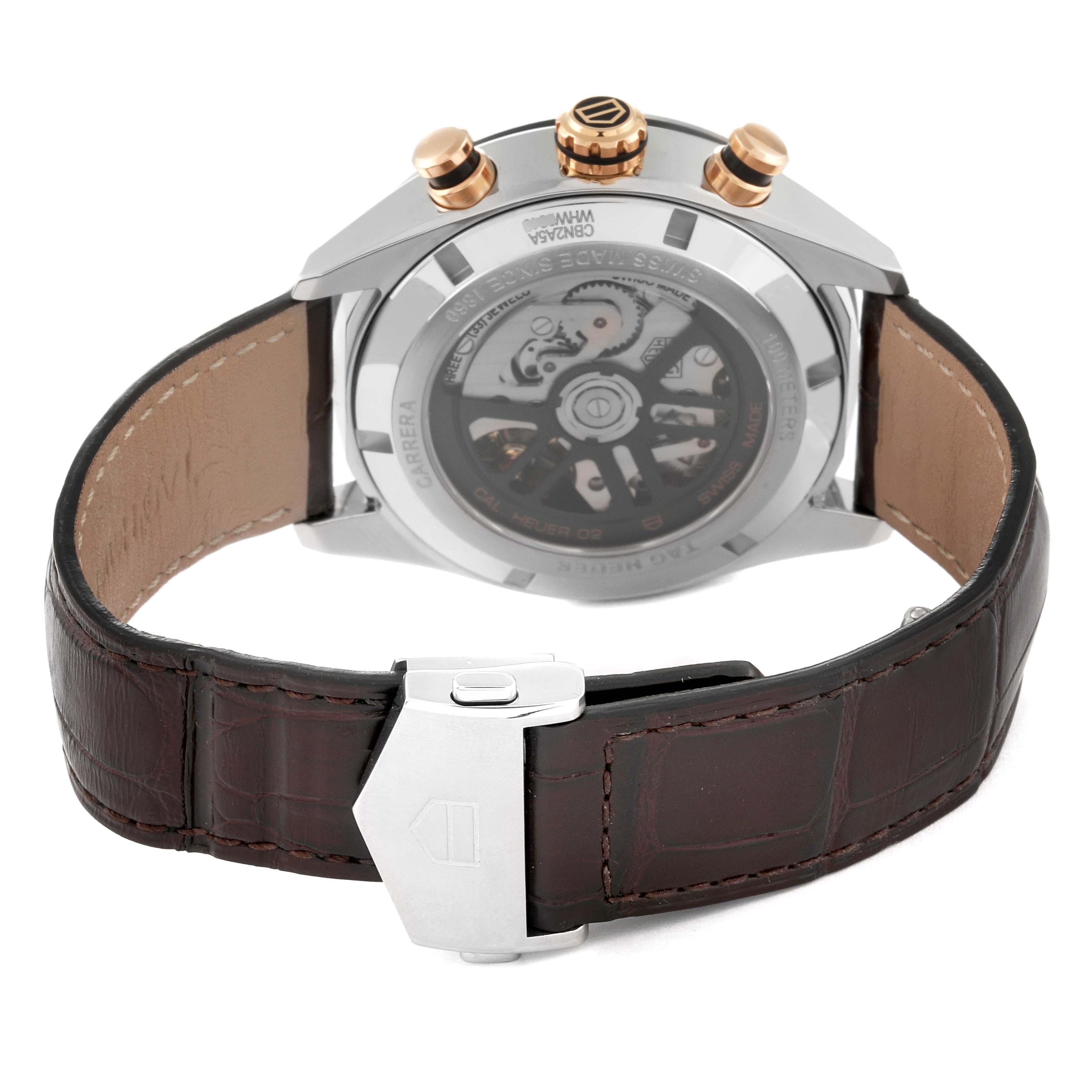 The image shows the back of a Tag Heuer Carrera CBN2A5A.FC6481 Men's Steel and Gold (two tone) Black Dial CBN2A5A.FC6481 Men's Steel and Gold (two tone) Black Dial watch, highlighting its transparent case back and brown leather strap with clasp.