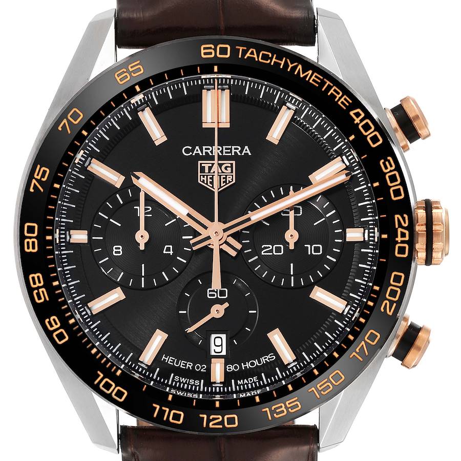 The image shows a close-up of the TAG Heuer Carrera watch face, detailing the dial, subdials, tachymeter, and pushers.