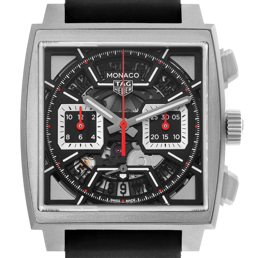 The image shows a front view of the TAG Heuer Monaco watch, highlighting the dial, subdials, and crown.