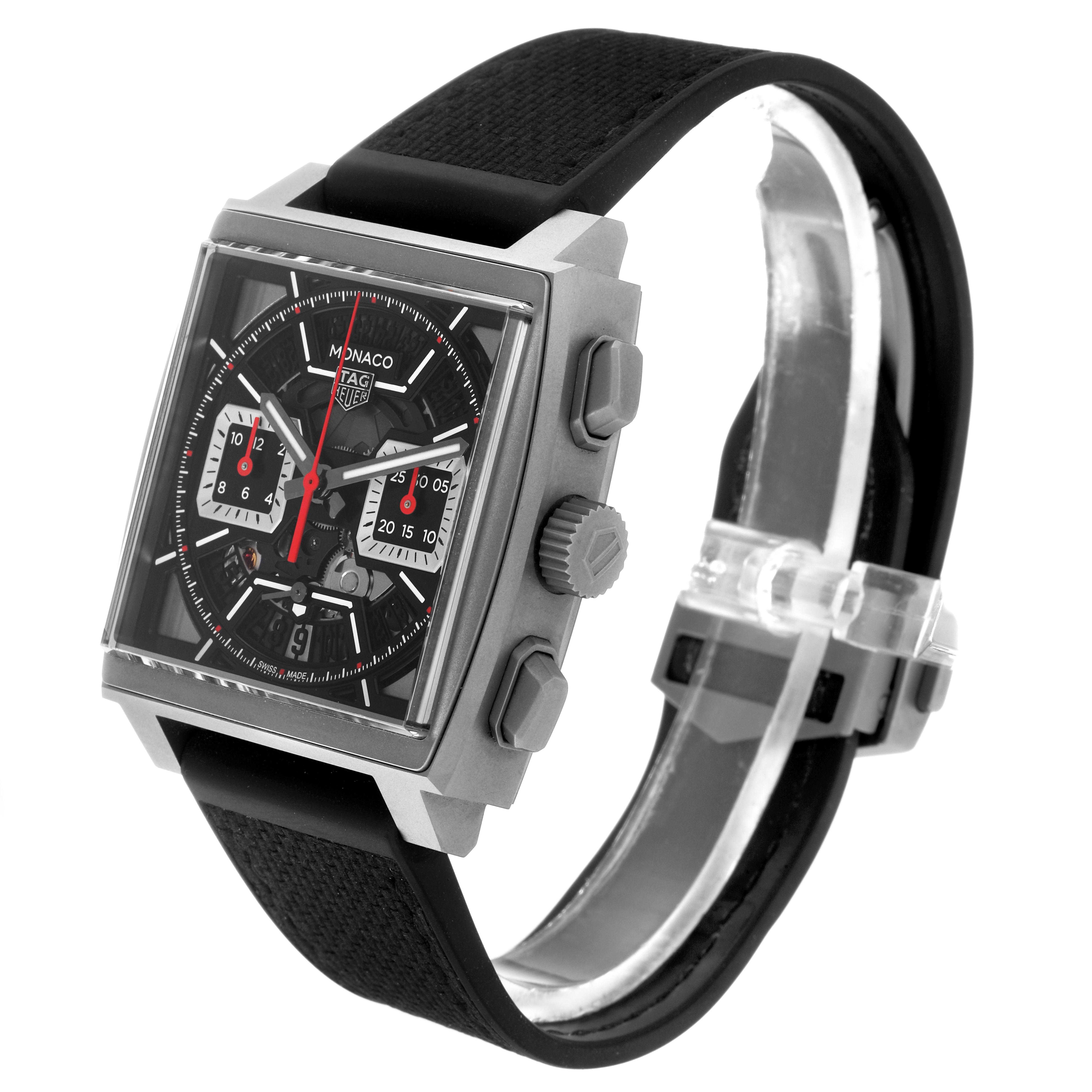 The Tag Heuer Monaco CBL2183.FT6236 Men's Titanium Black Dial CBL2183.FT6236 Men's Titanium Black Dial watch is shown at a three-quarter angle, highlighting the face, crown, pushers, and the black strap.