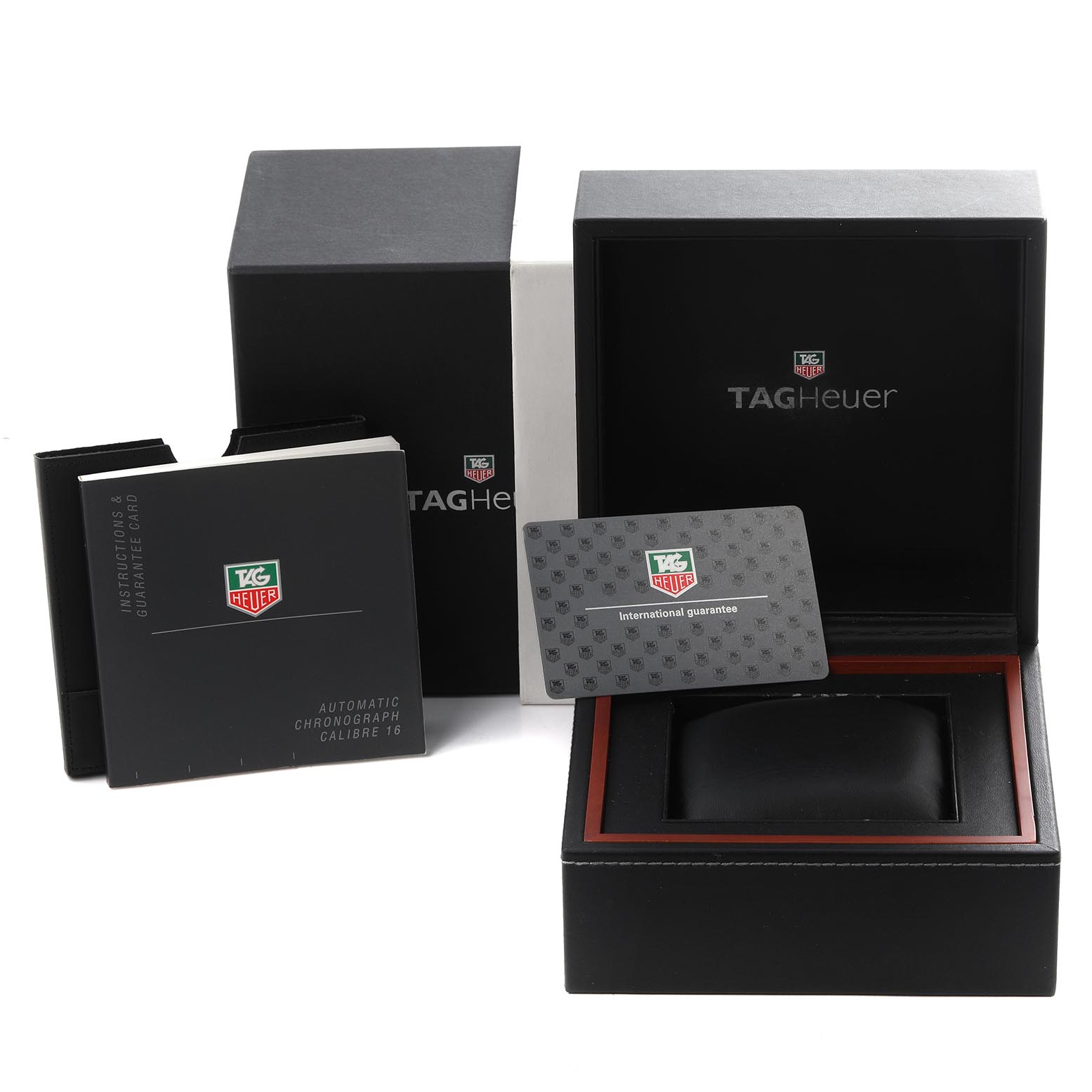 The image shows the packaging, instruction manuals, and an international guarantee card for the Tag Heuer Monaco CW2118.FC6207 Men's Stainless Steel White Dial CW2118.FC6207 Men's Stainless Steel White Dial watch.