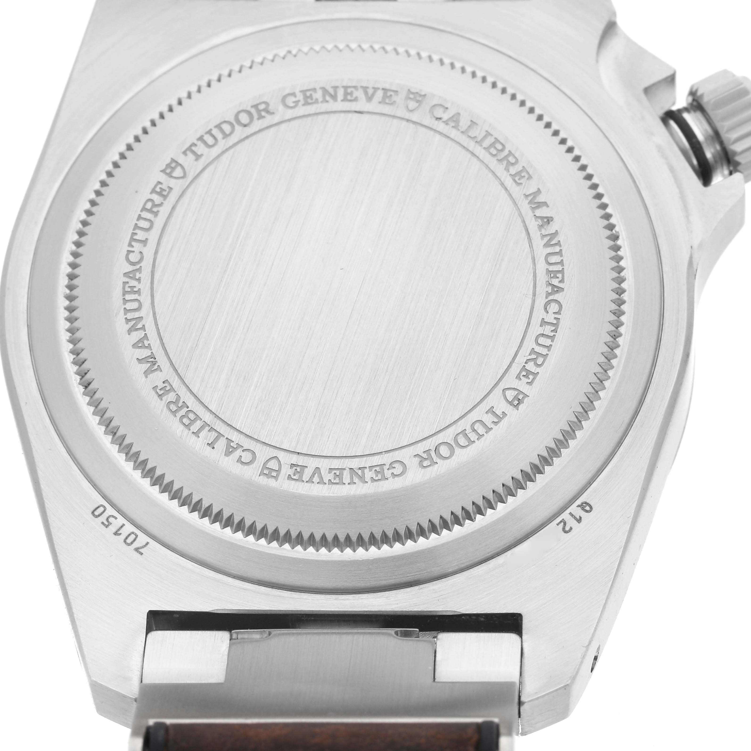 The image shows the case back of the Tudor Heritage Black Bay M70150-0001 Men's Stainless Steel Black Dial M70150-0001 Men's Stainless Steel Black Dial watch, highlighting the engraved details.