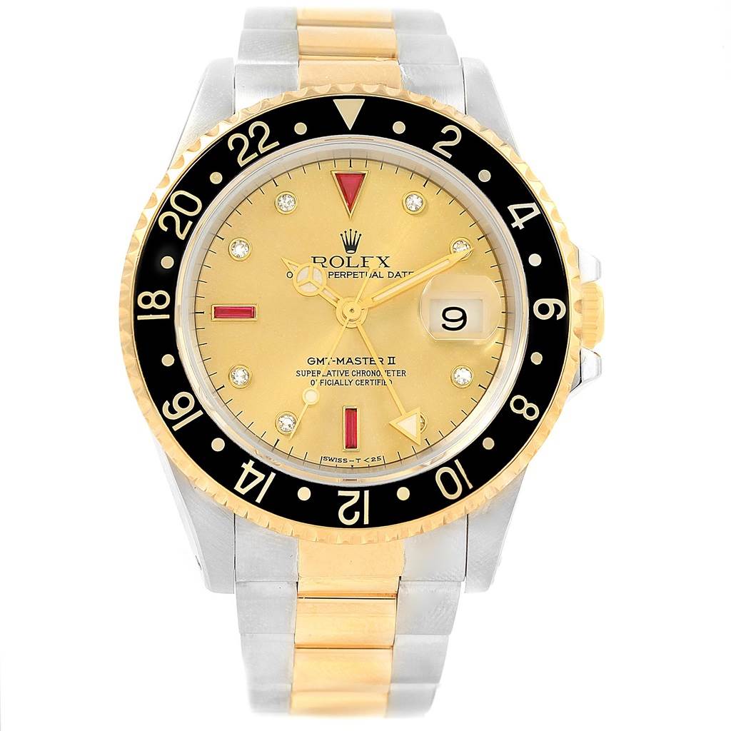 The image shows a front view of the Rolex 16713 Men
s Stainless Steel Champagne Dial 16713 Men
s Stainless Steel Champagne Dial GMT-Master II Yellow Gold Steel Diamond Ruby Serti Dial Watch 16713 model.