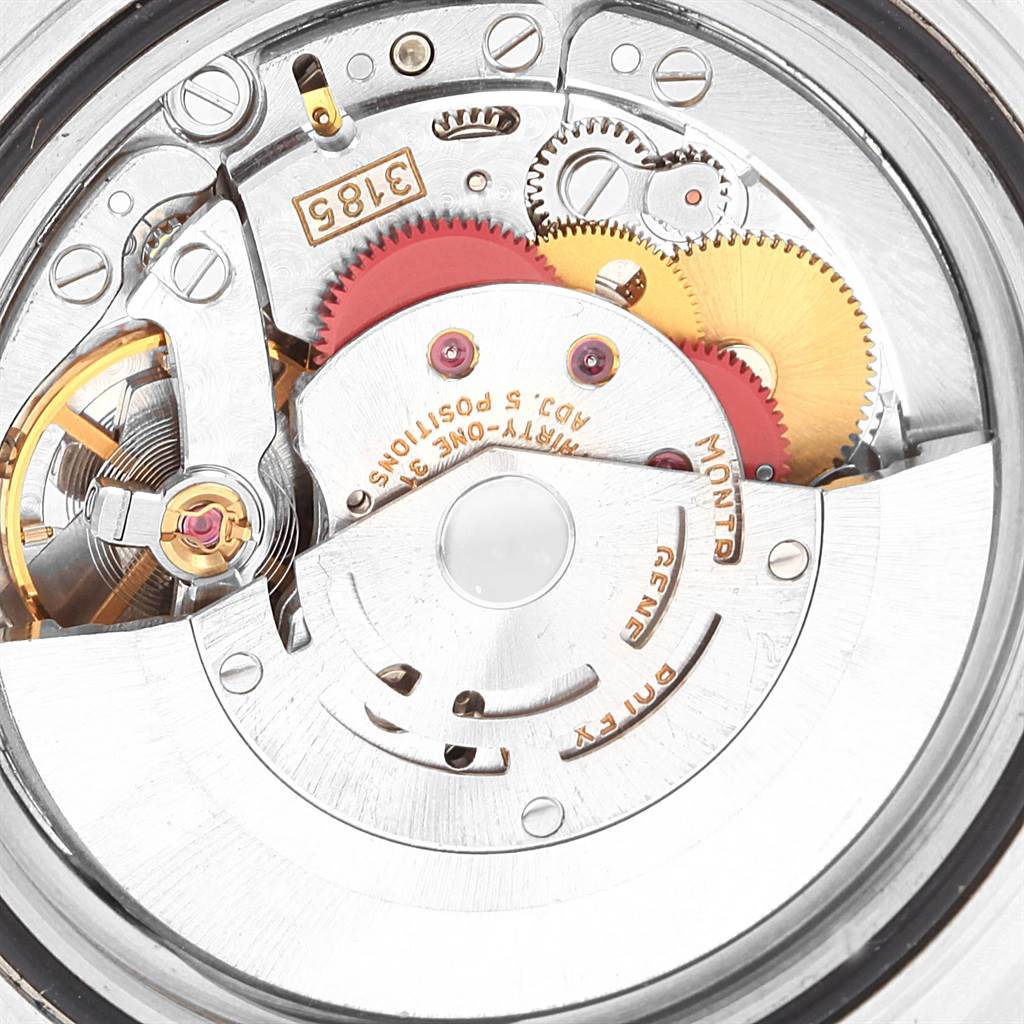 This image shows the internal mechanical movement of the Rolex 16713 Men
s Stainless Steel Champagne Dial 16713 Men
s Stainless Steel Champagne Dial GMT-Master II Yellow Gold Steel Diamond Ruby Serti Dial Watch 16713.