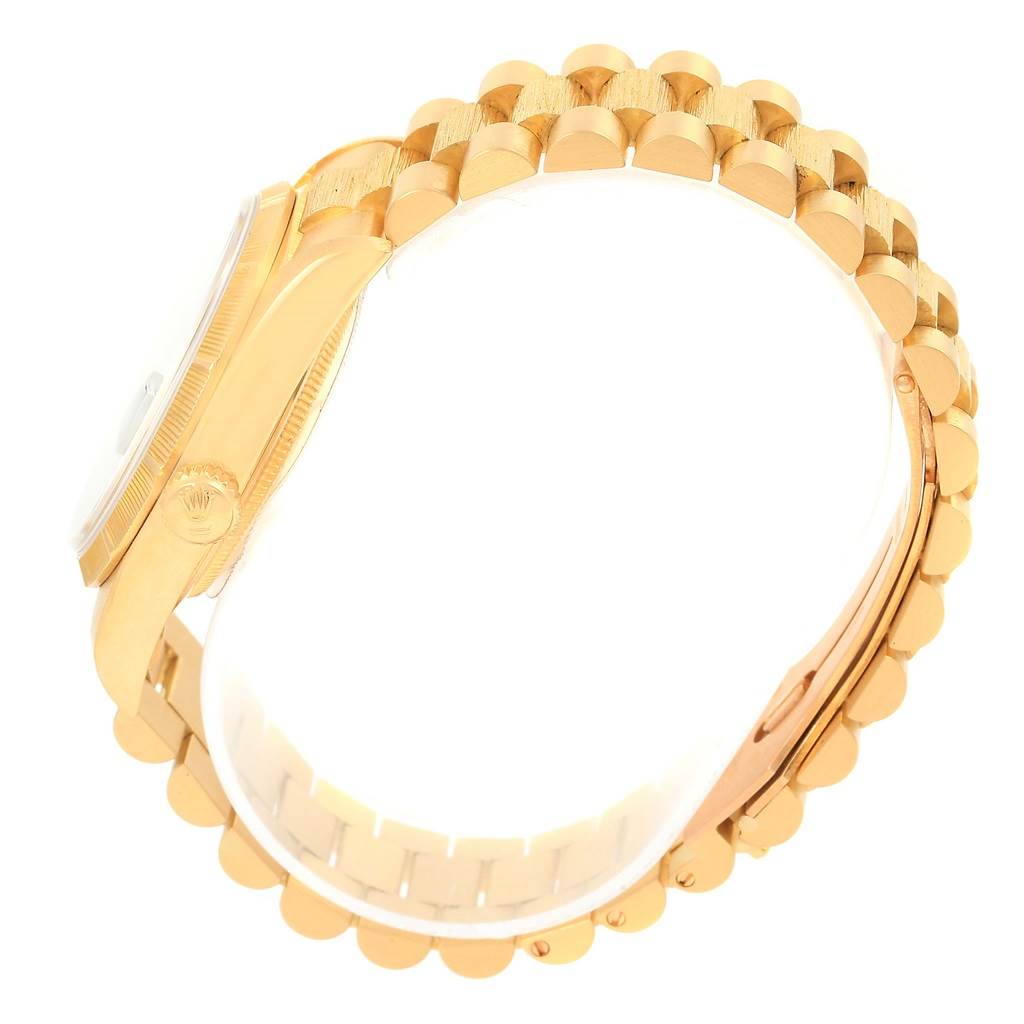 The image shows a side view of the Rolex 18248 Men's Yellow Gold Black Dial 18248 Men's Yellow Gold Black Dial Day-Date President Yellow Gold Black Diamond Dial Mens Watch 18248 model, highlighting the bracelet and case.