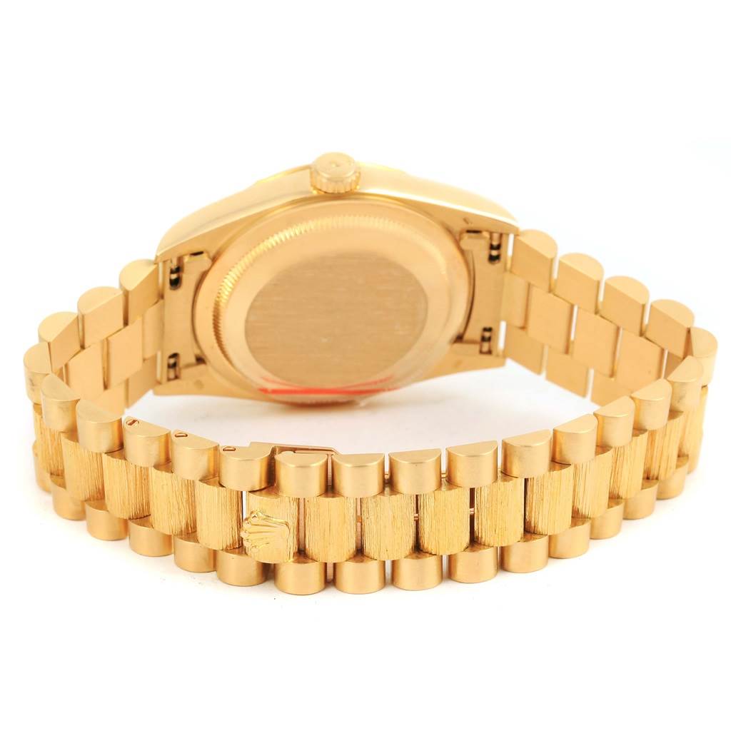 This image shows the back and bracelet of the Rolex 18248 Men's Yellow Gold Black Dial 18248 Men's Yellow Gold Black Dial Day-Date President Yellow Gold Black Diamond Dial Men's Watch, model 18248.