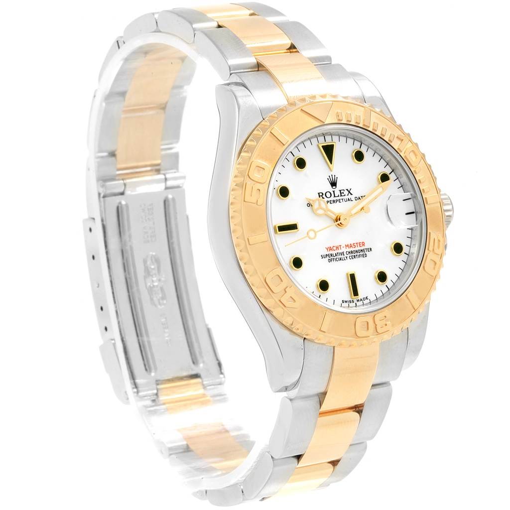 The image depicts a Rolex 168623 Steel and Gold (two tone) White Dial 168623 Steel and Gold (two tone) White Dial Yachtmaster 35 Midsize Steel Yellow Gold 168623 watch from a three-quarter front angle, showing the dial, bezel, and band.