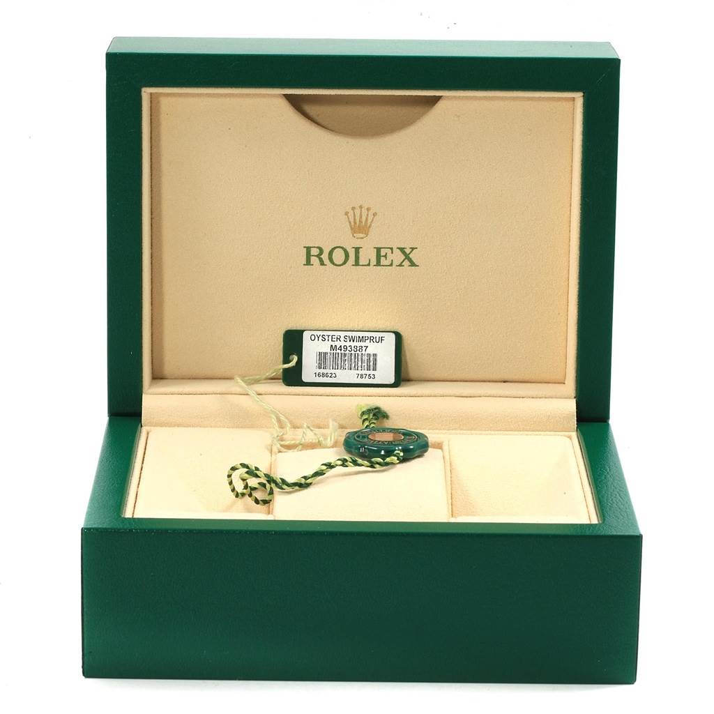 The image shows the open box of a Rolex 168623 Steel and Gold (two tone) White Dial 168623 Steel and Gold (two tone) White Dial Yachtmaster 35 Midsize Steel Yellow Gold Watch 168623 with tags and no watch inside.