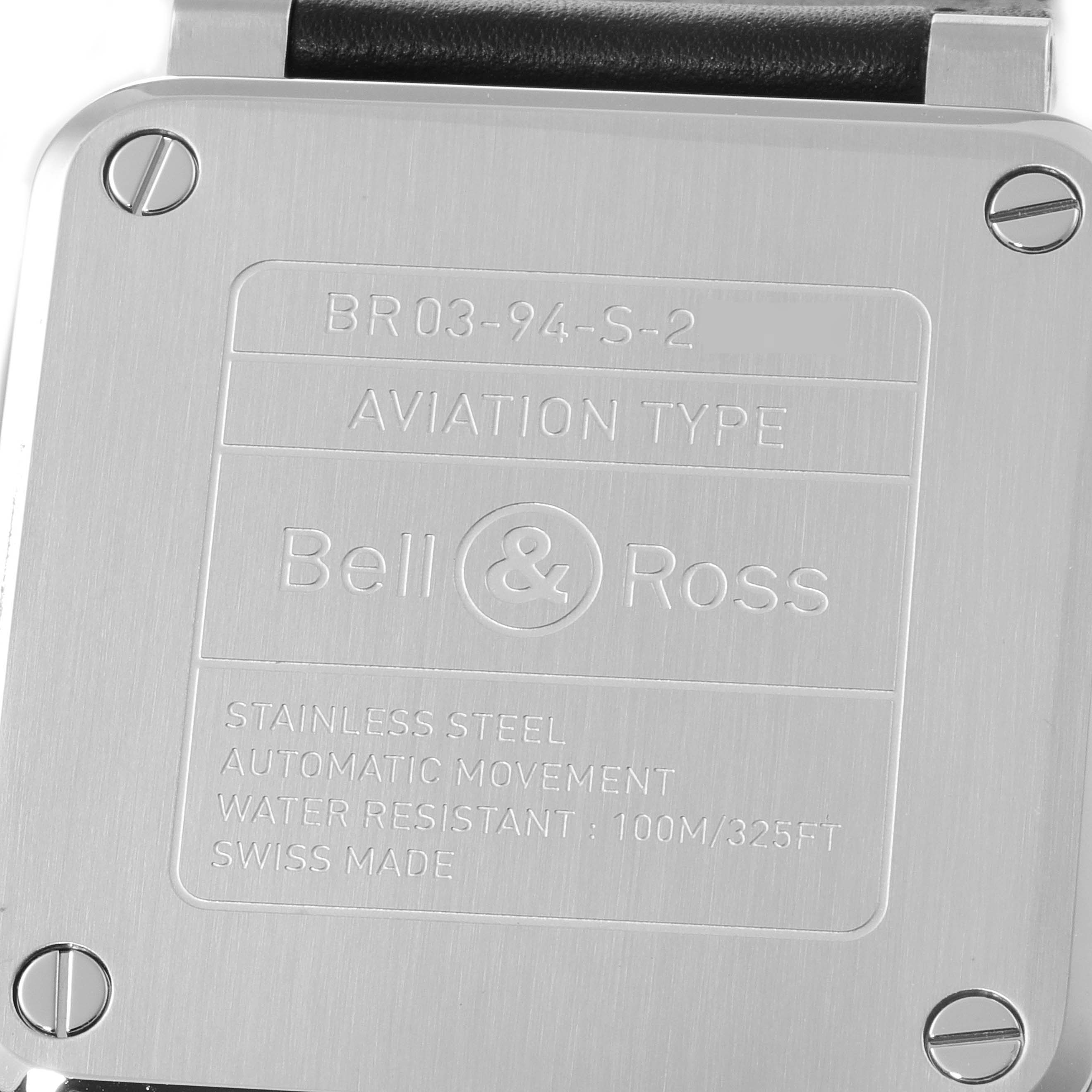 This image shows the back case of the Bell & Ross BR03-94-S-2 Chronograph watch, highlighting specifications and branding.