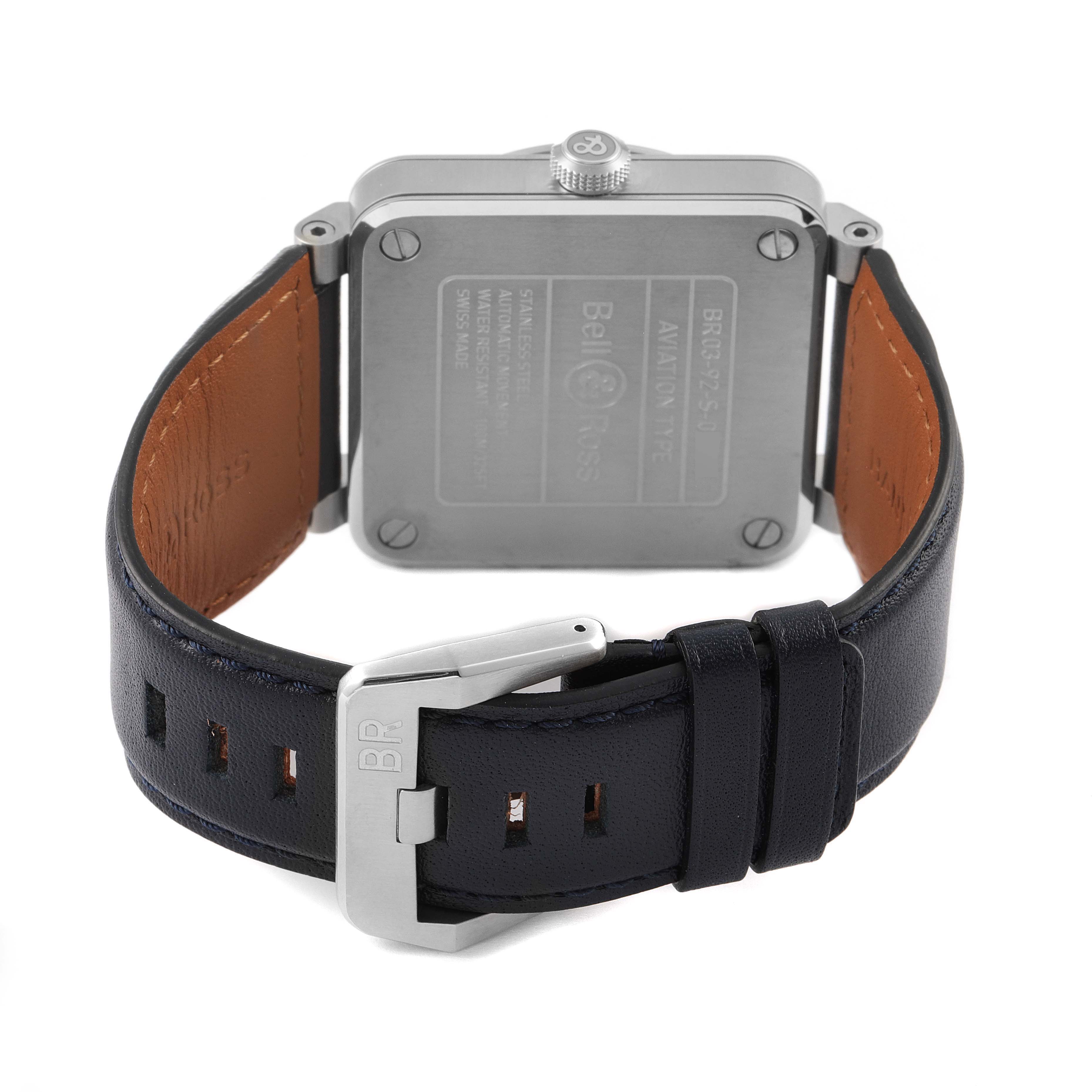 The image shows the back view of a Bell & Ross Aviation Blue Dial Automatic Steel Men's Watch BR0392 with a focus on the case back and leather strap.