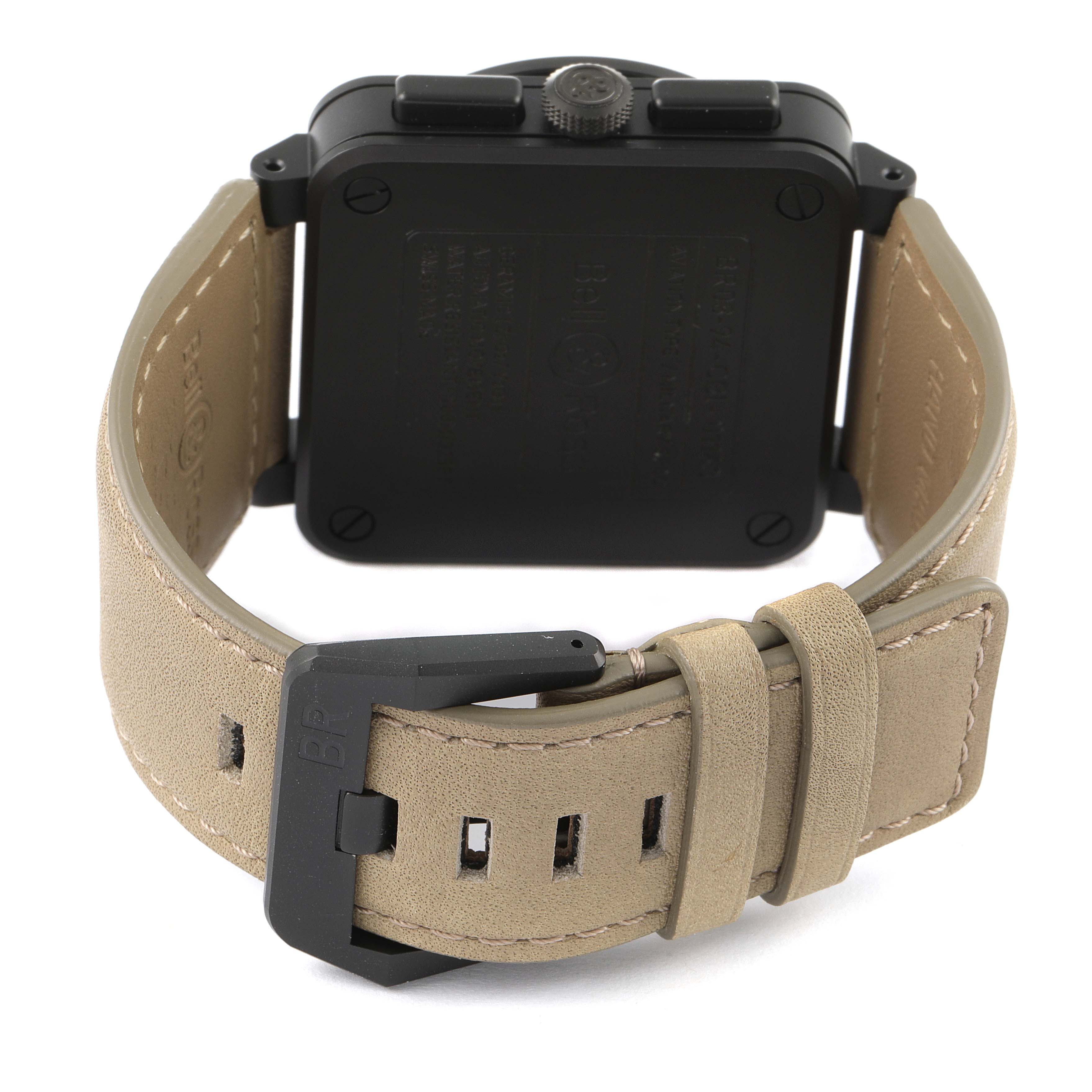 The image shows the back view of a Bell & Ross Chronograph watch, focusing on its case, strap, and buckle.