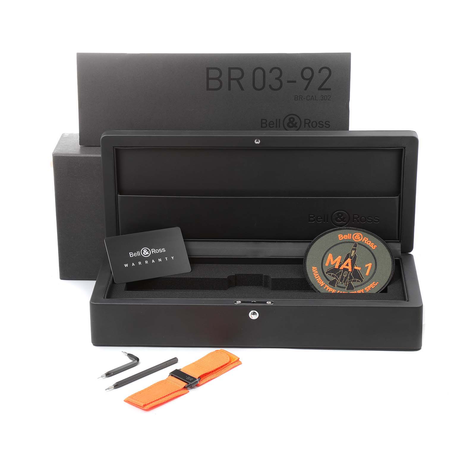 The image shows the packaging, warranty card, extra strap, and tools for the Bell & Ross Matte Khaki Dial Automatic Ceramic Men's Watch BR0392 Unworn model.